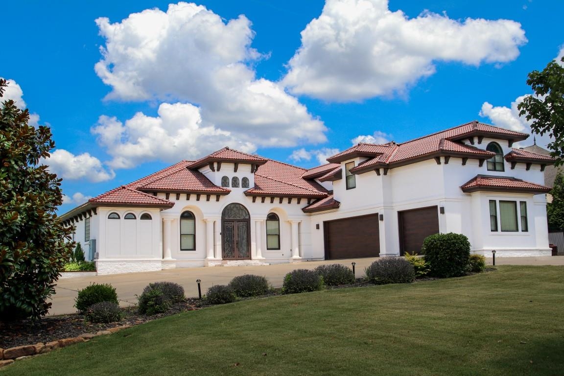 Mediterranean style home with golf course view. 4 beds/4 baths downstairs with and additional bonus room and bathroom upstairs. Plenty of living space downstairs with formal living area, dining area, hearth room with fireplace, and breakfast nook. The kitchen is a chef's dream with many amenities. Master suite has jet tub, double vanities and many other attractive features. Library/office just off master. Outside offers a salt water pool, wet bar, and wrap around patio.