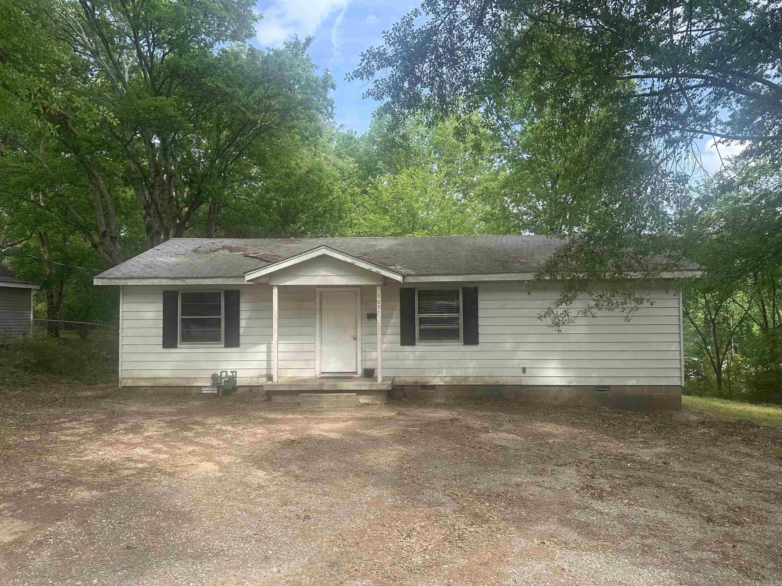 Unlock the possibilities with this unique property sitting on 3 spacious lots, zoned C-3 commercial boasting an impressive 111 feet of frontage road exposureāperfect for future commercial development or investment opportunities. The 1,054 sq ft home features 3 bedrooms, 2 bathrooms, and an eat-in kitchen, offering a solid foundation for rental income or a personal touch. Adding even more value, the property includes a separate workshop with electricāideal for storage, hobbies, or business use. The fully fenced backyard provides privacy and functionality, making this a versatile investment. Sold as is, this property is ready for your vision. Whether youāre looking to develop, renovate, or hold, the potential here is undeniable. Donāt miss this chance to capitalize on a prime location with endless possibilities. Schedule your showing today!