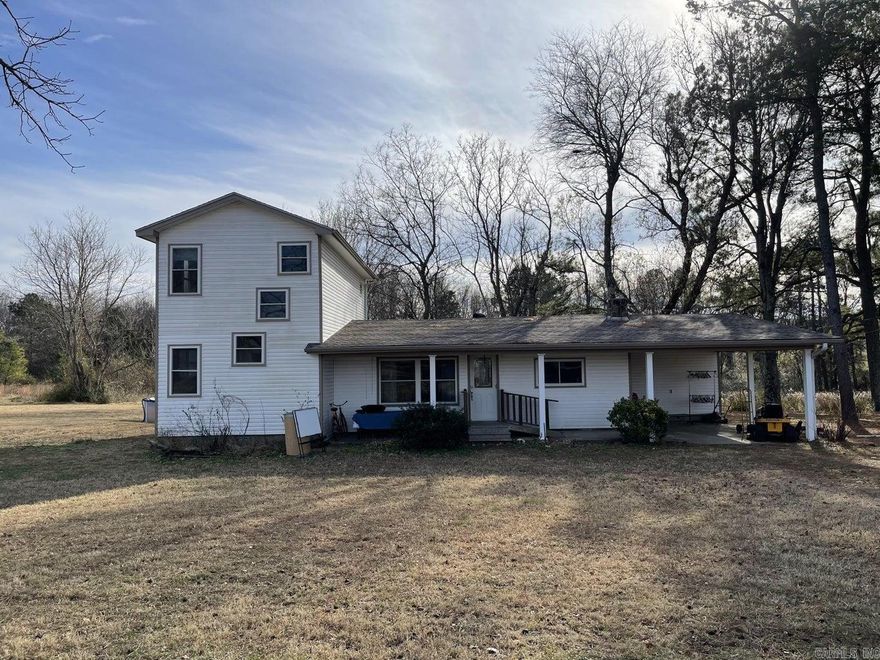 Peaceful setting on this 3 bedroom 1.5 bath country home on 7 acres +/-. Located out in the country but off a paved road and it's still close to town. Home has a semi-open floor plan with large kitchen, and a large laundry/mudroom. This could easily be updated to fit your needs! There is an additional outbuilding that can be used for storage.