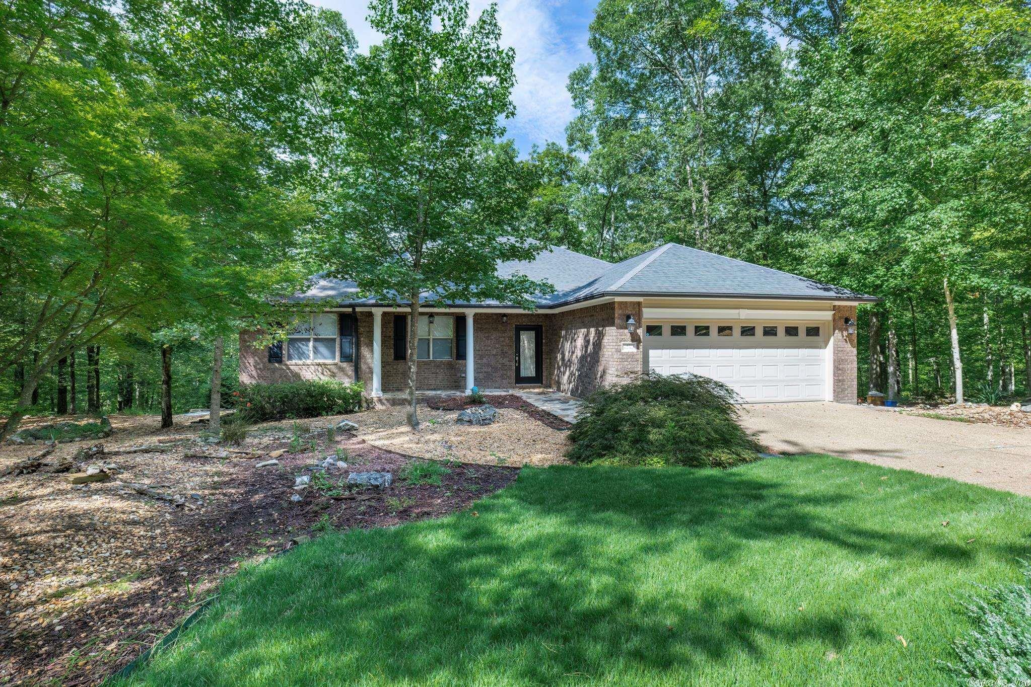Why not enjoy the beauty of nature and country living in a secure community with all the luxuries of the city. Offering 3 lots which = .75 of an acre with privacy but not seclusion along with the beauty of a flowing spring fed creek. Built in 2009 with approximately 2300 square feet of living space this 1 level home offers and Ar Room, 3 bdrms & 3 bas, fpl. Two rooms below 1 with full bath that are h/c for a shop or hobby area. Wood walkway from house to free standing deck by the creek. HOME OFFERS WHOLE HOUSE GENERATOR- Priced to sell at $369,000, Monthly POA dues are $100 for home and $92 for both additional lots for a total of $192.00 monthly. Agent see remarks.