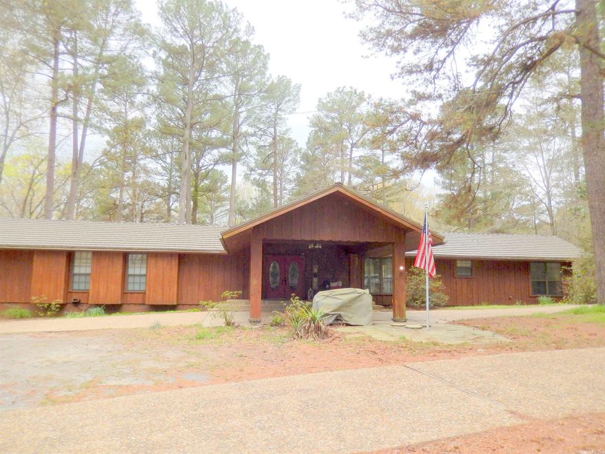 Come see this fantastic home that sits on a private and quiet country setting of 10 acres that is easy city commuting. Massive stone fireplace in the living area. The cook of the home will love the open kitchen with a lot of cabinets and counter space. Spacious 4 bedrooms with the master suite located in private the home. Sit on your wrap around deck in the morning and watch the wildlife.