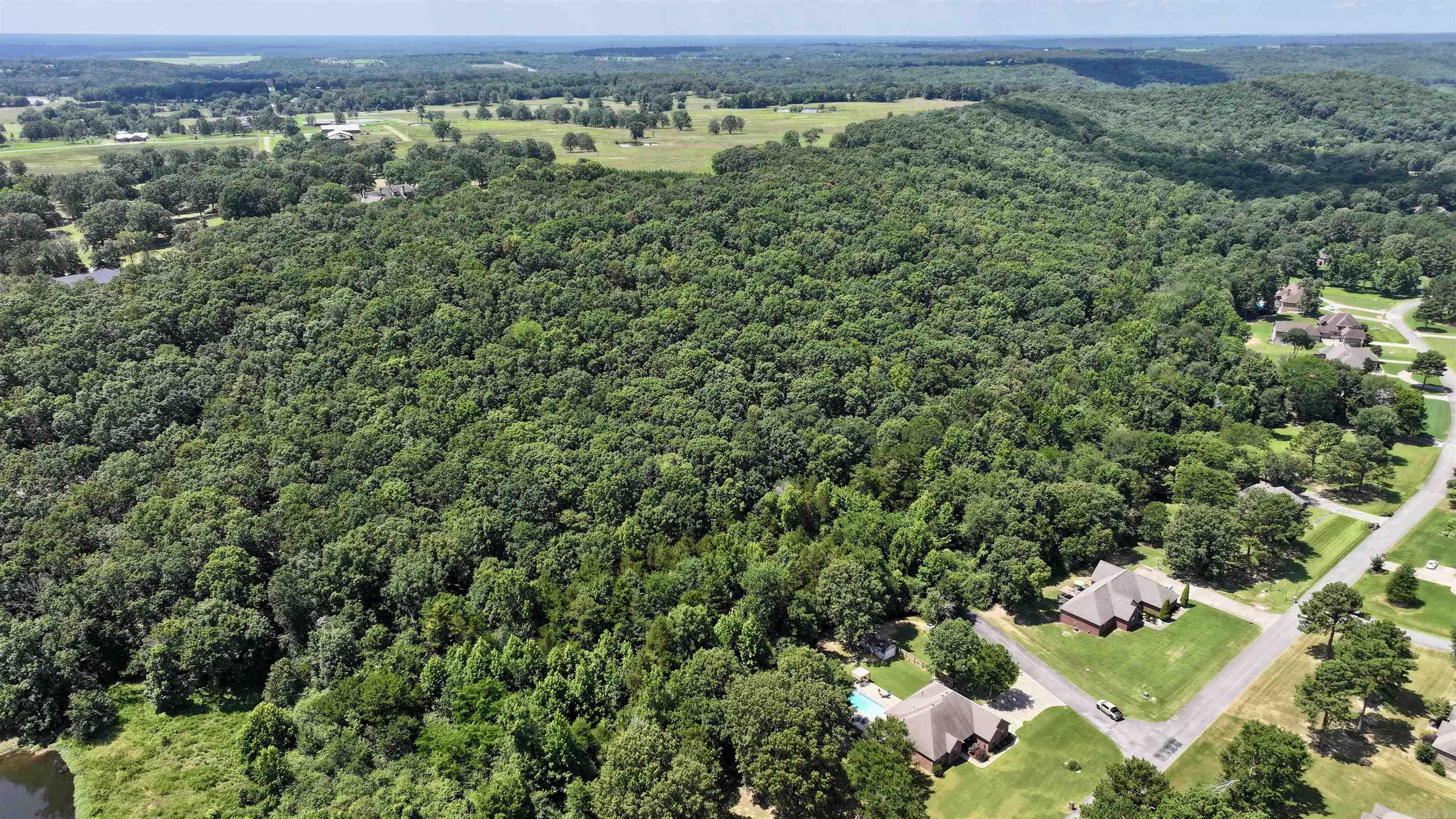 Discover the perfect blend of privacy and suburban living on this acreage right off of Club West Estates. This exquisite property offers an unparalleled opportunity to create your dream home surrounded by serene beauty and exclusivity. Imagine waking each morning to the tranquil sounds of nature, with the freedom to design a residence that reflects your unique style and preferences. For wildlife enthusiasts, this property is a paradise teeming with diverse wildlife, including deer that grace the landscape. Picture yourself enjoying a quiet morning on your back deck, sipping coffee while watching deer roam your landāa truly enchanting experience that brings nature's wonders right to your doorstep. Donāt let this rare opportunity slip away. This incredible acreage combines privacy, community, and natural beauty, making it an ideal location for your future home. If youāre eager to explore this unique chance to secure a piece of paradise, letās arrange a visit. Seize the moment to build your dream home in this extraordinary setting.