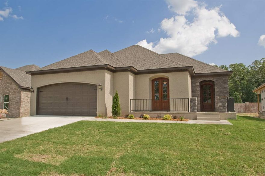 THE WOW house! Builder went over the top on this one! Open Floor plan! Beautiful stained cabinetry! Hand scraped wood floors! Corner fireplace!Craftsmanship shows every inch! This house is 3 bedroom...but, one bedroom opens to the front. Fantastic office concept! Wait until you see the master bedroom! Bath! AMAZING master closet! You will not believe it!  Master opens up to private patio! Mediterranean Style! Builder has been building a long time and it shows! Do not settle! Buy one of the better ones!