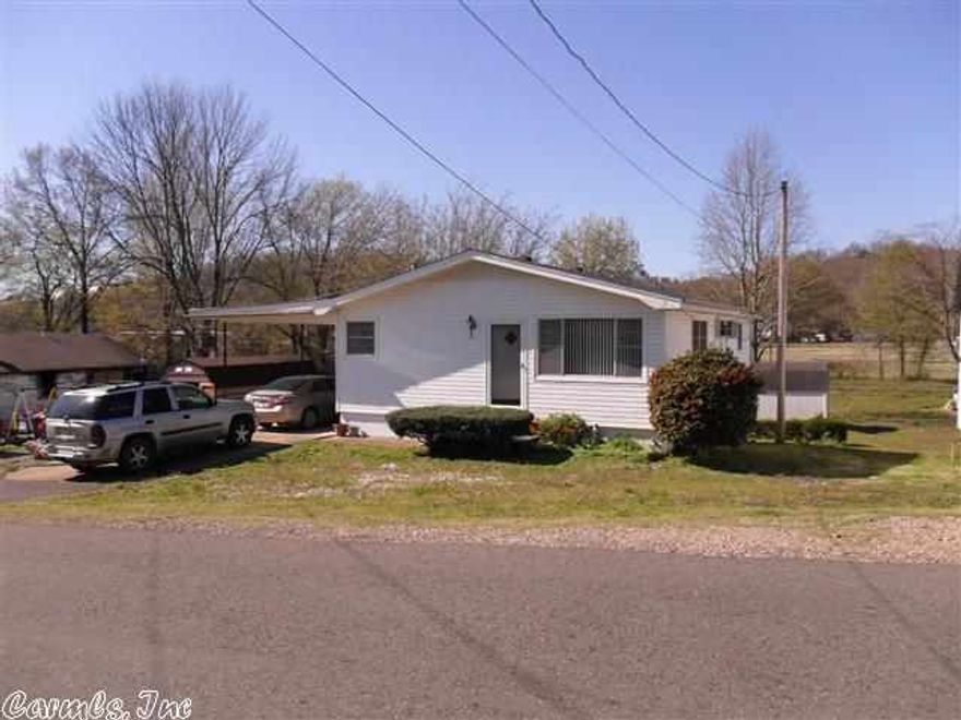 This is an immaculately kept 2 bedroom, 1 full bath home with walk out basement.  The main level has refinished original hardwood floors.  Kitchen has been updated with all new appliances, plus washer and dryer convey with sale.  Living room is a very nice size and is open and airy.  Downstairs, there is a cellar and a large room that could be an extra bedroom, hobby room or recreation room that has a door to the outside.  Storage shed, attached carport.