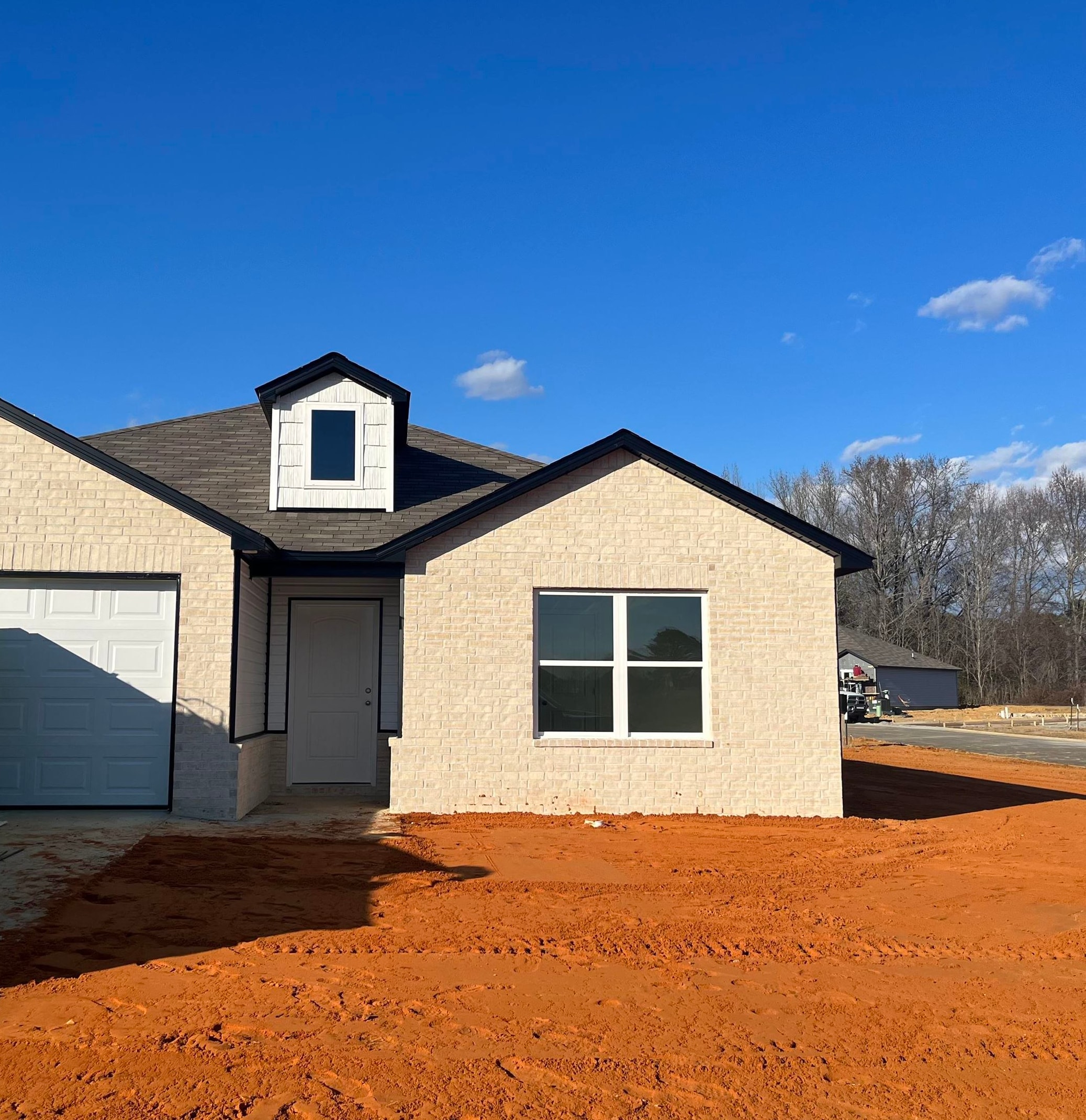 The Foster II plan is a fan favorite. It comes with a covered patio and also has a large Master closet that's separate from the Bathroom. This home is on a corner lot. Come see it today! Valuable upgrades in this home: 60" fiberglass standup shower (no enclosure) in Master Bath, both toilets upgraded to elongated, plumbing faucet upgrade 2, 8" deep Kitchen sink, 50 gallon water heater, HVAC rigid duct upgrade, 16" laminate bar top in Kitchen, Luxury Vinyl Plank flooring in wet areas and Living Room and adjacent hallways, raised ceilings in Living Areas per municipal requirements, fiberglass exterior doors, Cheyenne style doors, baseboards level 2, LED disk lights in Kitchen, full sod, stainless steel appliance package, corner lot. *** AGENTS, PLEASE SEE SHOWING REMARKS OR AGENT REMARKS FOR VERY IMPORTANT INFORMATION. *** THIS HOME IS SCHEDULED TO BE COMPLETE IN MID JANUARY 2025.