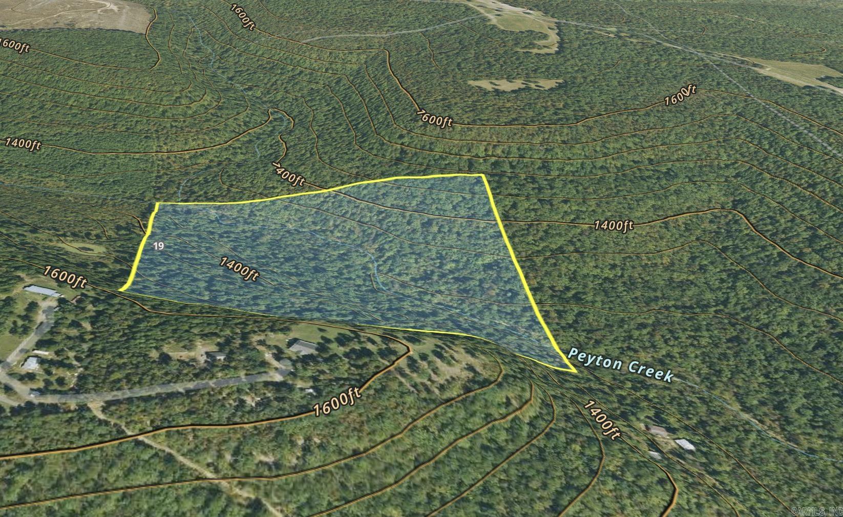 45 minutes away from both the Ozark National Forest & Buffalo National River, this wooded acreage is waiting on you to come and make it yours! Not looking to build? This could be the perfect hunting property, as wildlife is abundant. Petyon Creek runs through the middle of this 40 acres. In the summer, go visit your property then hop on down to the Buffalo to float! A well will need to be drilled for water. There is a deeded utility easement for utilities. Petit Jean Electric Coop is the electricity provider and Petit Jean Fiber provides internet. *Buyer please verify all information prior to closing*