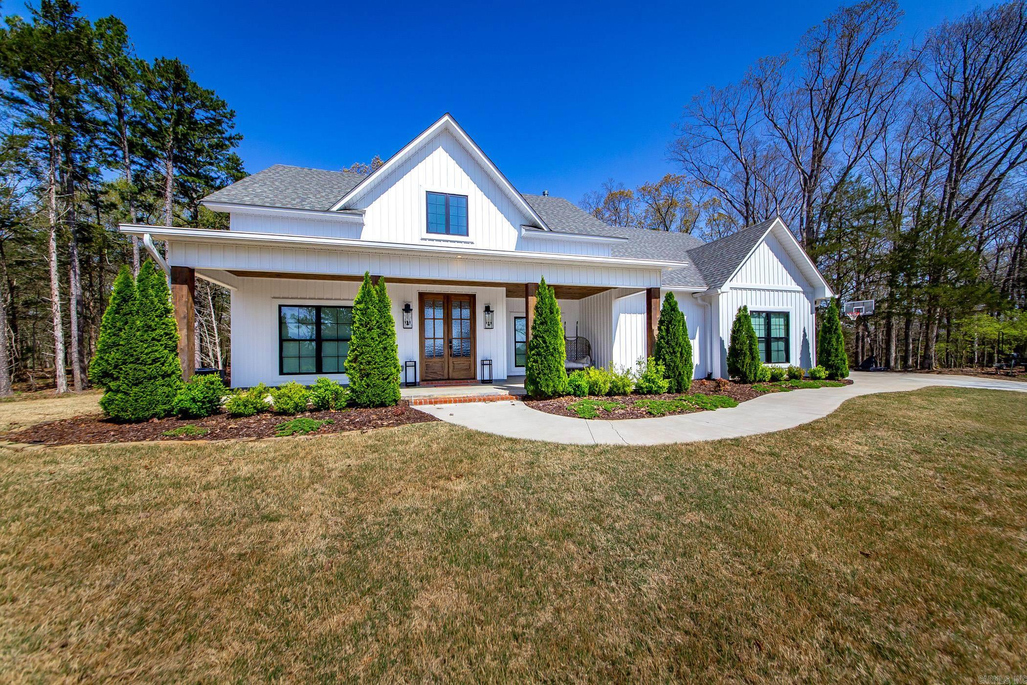 Beautiful open floorplan Lake House that's ready for your next get away or full time lake living. Includes a boat slip.