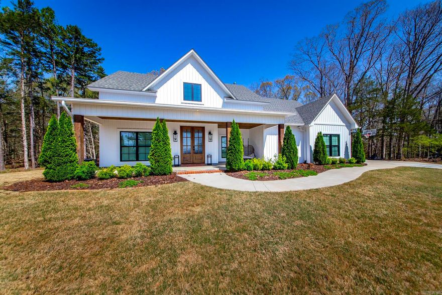 Beautiful open floorplan Lake House that's ready for your next get away or full time lake living.  Includes a boat slip.