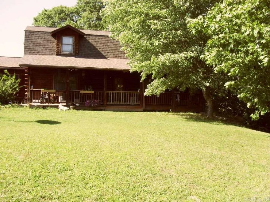 This is a 2 story & walk out basement log home located in Glenwood, AR. Home has  2700 sq. ft. Heated and cooled. 3 bedrooms, 3 bathrooms, 2 car garage and a 1,189 sq. ft. Walk out basement. Home was built in 1993. Has Rock Chimney, gas hot water heater, gas heat & electric air. There are 2 baths & 3 bedrooms upstairs. Main level has living room, full bath, kitchen/dinning, laundry room & formal dinning room. Basement has bedroom, bath, den & large bonus room dried in. This property is being sold "As Is"