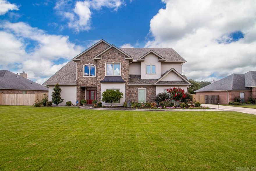 This house has it all!  It is located on the water in Northlake.  It features 4 bedrooms, an office/theater room, a safe room, a screened in porch, and a 3 car garage.  The kitchen is a chef's dream with a gas stove, double oven, and lots of storage.   You'll love spending time on the balcony outside of the primary suite overlooking the lake.  The solar panels are paid off and and reduce the electricity to $35/month. It has sprinklers, gutter guards, exterior lighting, intercom system, and two attic spaces.  Call to see it today!