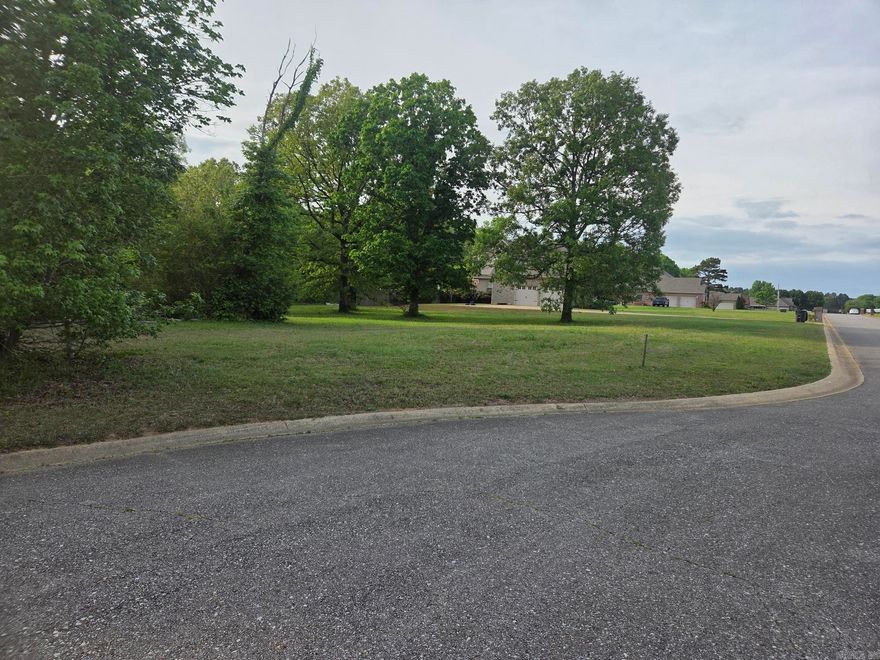 Rare find & very nice level 1.46-acre tree covered lot in SW Searcy just outside the city limits. Leave some large mature trees around your 2,000+ sq. ft. minimum living space new construction home. There are only nice big homes located in The Cornerstone Estates Phase II subdivision & this is the last lot available. Enjoy the peace & quite low traffic area at the back of the subdivision while still only being a short drive to amenities. Easy access to Hwy 13 to bypass Searcy going to Little Rock. Lot has already had a perc test done for a 4-bedroom house. Underground electric & water at the road.