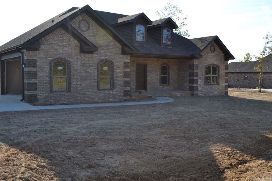 Beautiful custom built 3 bedroom, 2 bath home with open floor plan, granite counter tops, tile back splash, large rooms, hand scrapped wood flooring, dripping with crown molding.  Call today for more details.