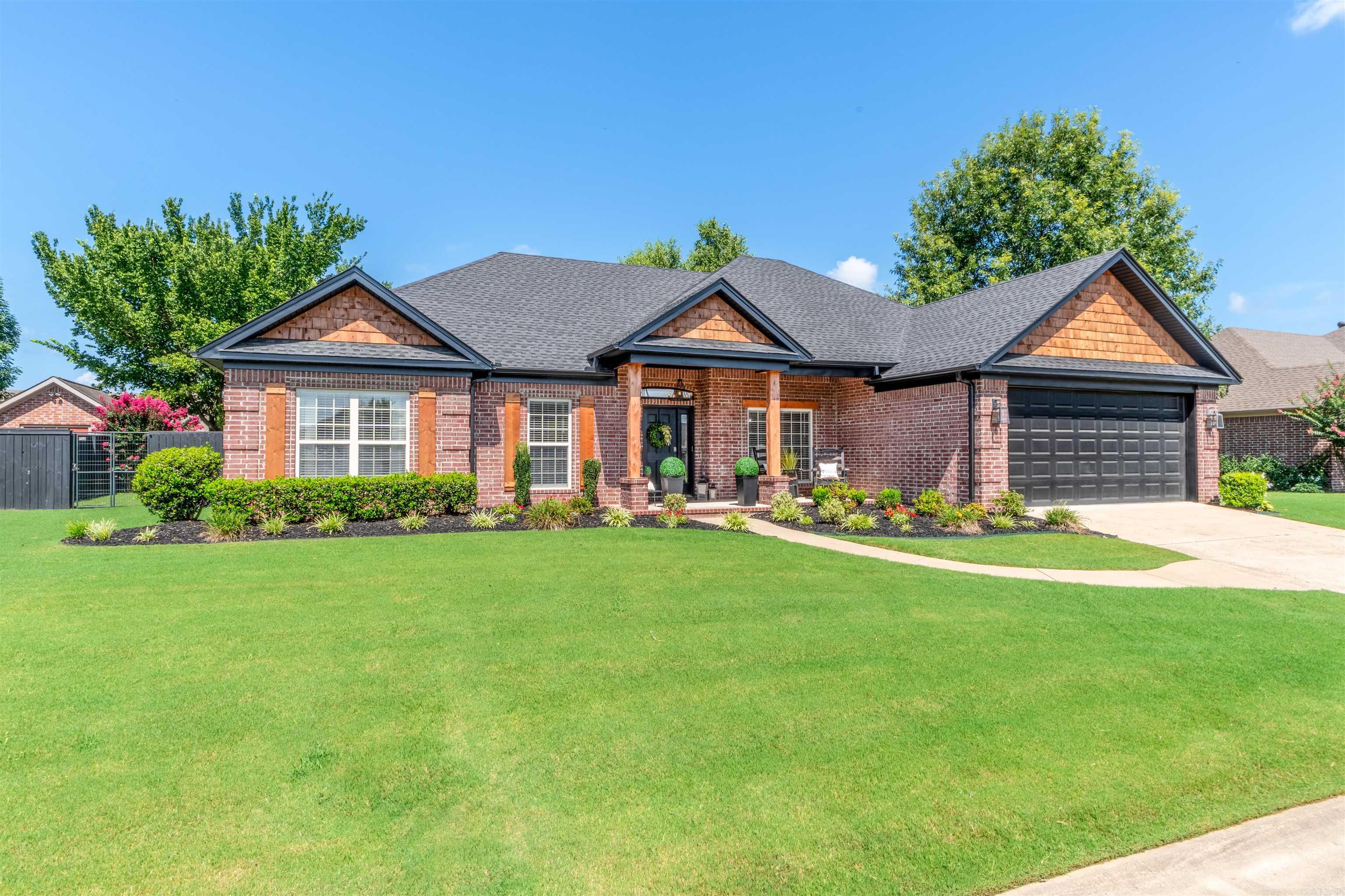 Beautiful Modern Updated 4 bedroom, 2.5 bath home in the heart of Searcy. This home has many updated features from inside to the outside. With the open concept from the living room to the kitchen, this makes entertainment more convenient for your friends and family to gather and sit at the island, with overflow space in the dining room. The kitchen has beautiful modern black backsplash and a nice built-in electric range, and let's not forget the built-in sink in the island with butcher block. The bedrooms offer a split floor plan, giving the master bedroom privacy away from the other rooms. There is a half bath conveniently located off the kitchen for guests. The outside has cedar siding, wood shutters, with cedar posts on the porches, wood tongue, and groove ceilings that bring you the modern farmhouse style with an inviting backyard great for outdoor entertainment. This home is a showing stopper!!!