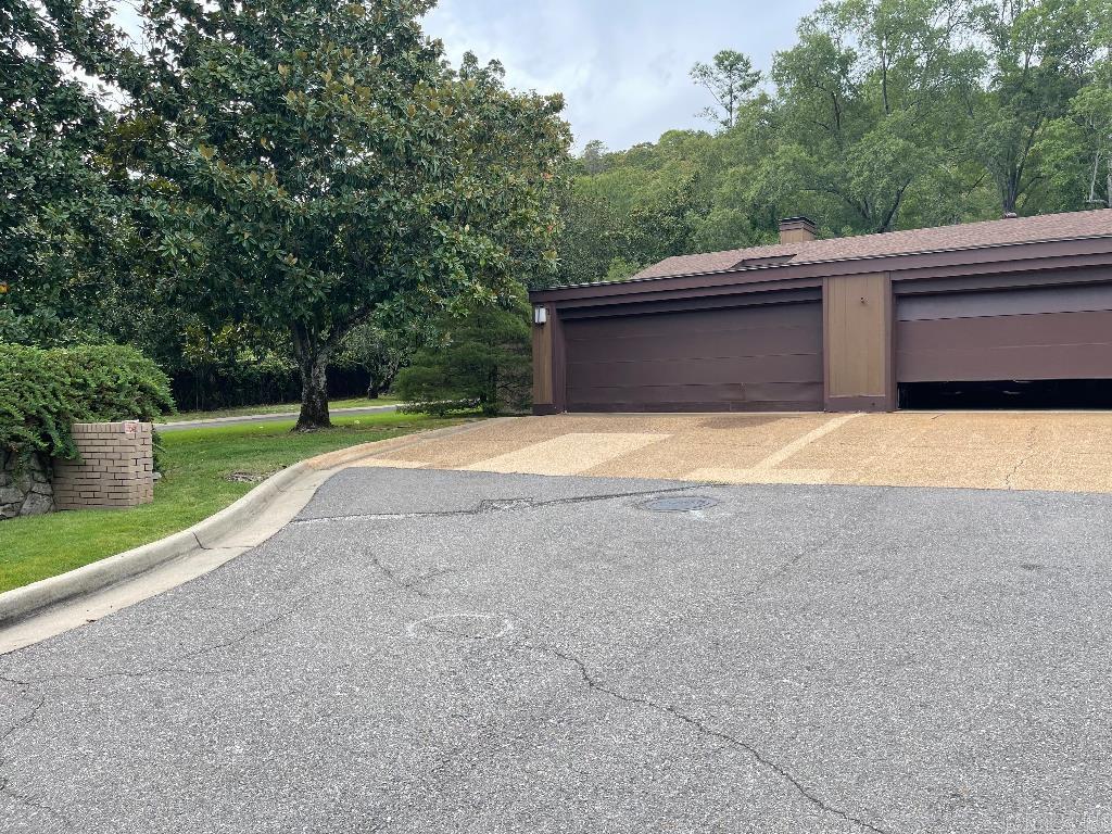 TOWNHOUSE 1,886 SF. Needs Updating. 2 BD, 2 Full BA, LR, Sep DR, Kit, Den/3rd BR. Lrg Foyer. NEW ROOF July 2024. 2-car garage. Front & backyard have 6 ft privacy wall. LR, DR, and Foyer have high clerestory windows. POOL.Please excuse clutter in photos, owner is packing. Living Room 21 x 14, Dining room 14 x 10, Family room 16 x 12, Kitchen 15 x 10, Foyer 14 x 7, Master Bedroom 16 x 14, 2nd Bedroom 11 x 12, Closets and hallways not included In measurements.