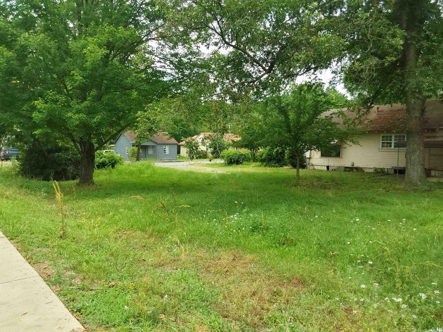 There is a home and garage on property. The home is at no value and needs to be torn down. The property is being SOLD AS IS, WHERE IS, value is on land only. Buyer is responsible for tearing down any structures on the property at their expense. DO NOT GO INTO THE HOUSE!!! CAUTION! AGENT SEE REMARKS!!!