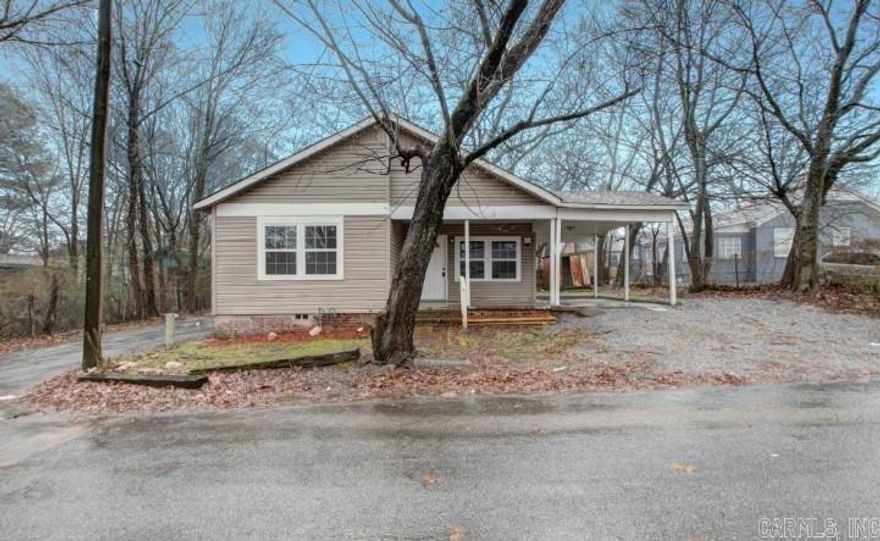 Beautifully updated home that will make a great investment property. The cabinets and countertops were stolen during a recent vandalization, so this one will require a little work to get it move-in ready. Their loss could be your gain! This home is being sold for less than it was recently purchased for. Add this one to your portfolio today and have it on the rental market next week.