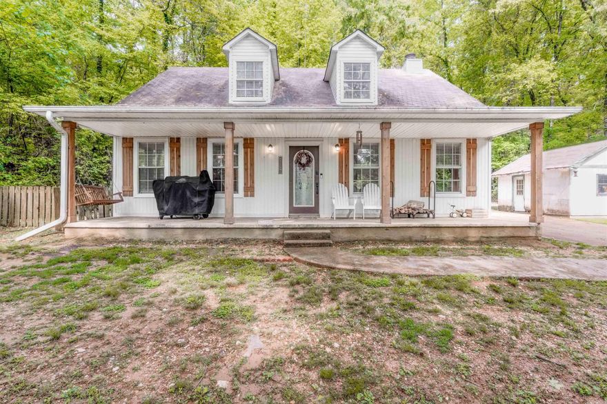 This beautiful country style home is nestled up off the road, secluded around beautiful trees that brings your family nice quiet country living. The primary master bedroom is on the main level with ample space, walk-in closet and spacious bathroom. The living space has built-in bookshelves with vaulted ceilings that provides natural light from the skylight and you can enjoy a nice fireplace in the winter with a wood burning fireplace. The kitchen has an open concept to the living space so you can still enjoy time with family and friends with making supper. There is a half bath downstairs with two bedrooms and bath upstairs. 13X16’ storage building. MUST SEE!