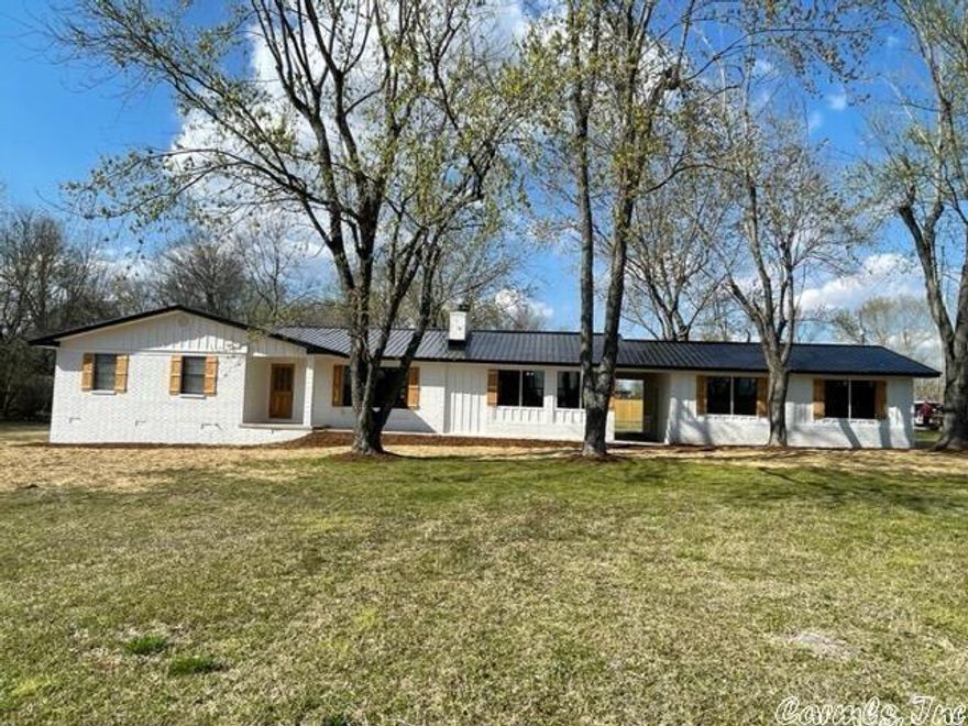 This house has it all, from the eye catching curb appeal to the fully updated interior, you will just want to bring your bags and move in! House features 3 bedrooms, 2.5 baths, 2 living areas, fully updated kitchen with new appliances and a open floor plan. The breezeway connects to the garage and there is a separate storage building out back along with privacy fencing. The large level lot is over 1 acre and gives you plenty of outside space to enjoy.