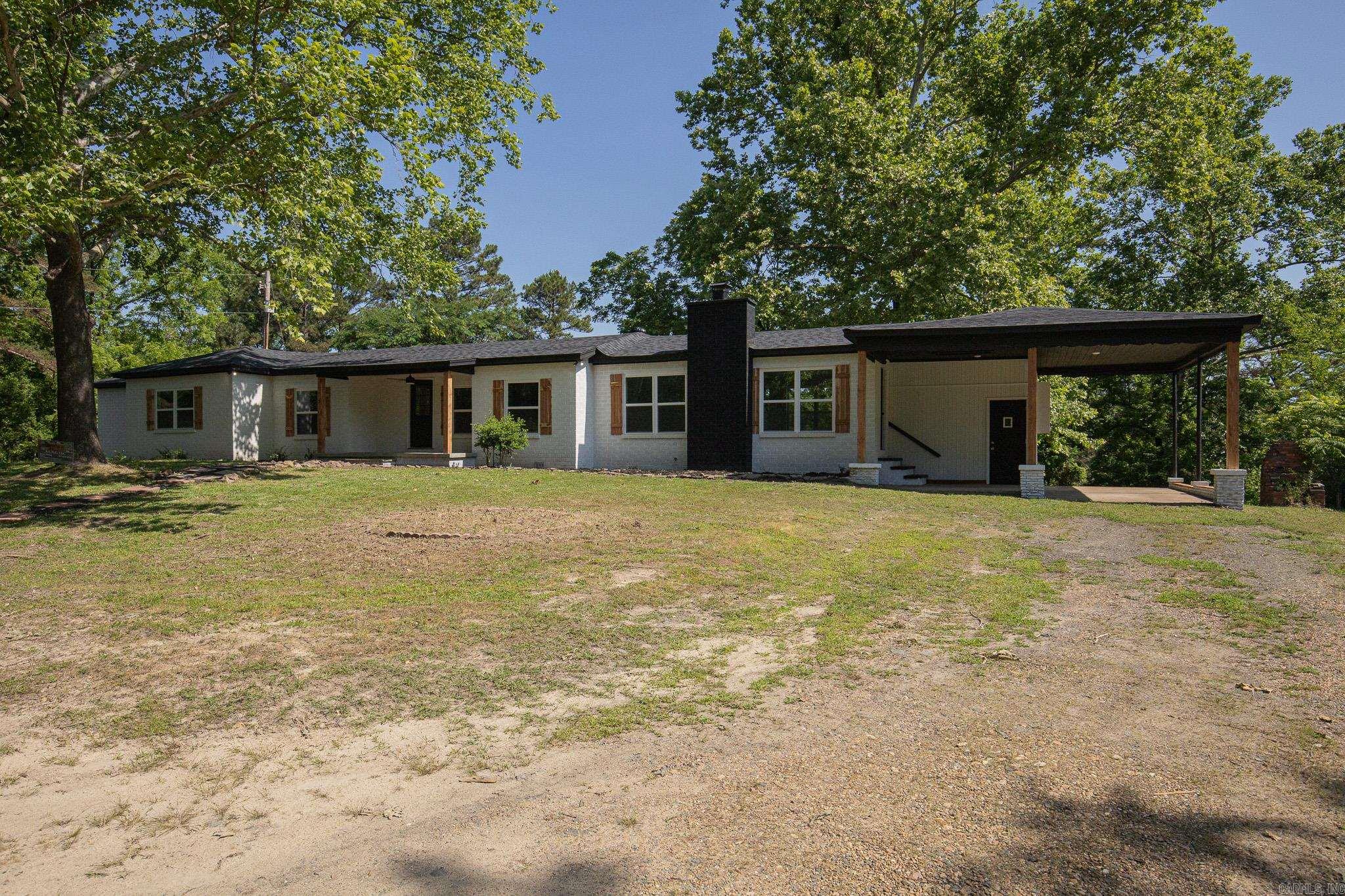 Back on market at no fault of seller or home! Stunning fully remodeled 3 bed 2 bath home just minutes from Lake Degray! Nestled on 1.26 acres, this home is less than 4 miles from boating, fishing, and family favorite outdoor activities. Bright, open, and airy, this home features quartz countertops in both bathrooms and kitchen, a cozy wood burning fireplace, spacious laundry room, and three large bedrooms. The master suite is stunning with marble tile for both the flooring and the walk in shower, a fogless vanity mirror, and a bluetooth rain shower head. Outside is a private oasis perfect for relaxing. New roof, HVAC, tankless hot water heater, and so much more. This move in ready home is waiting for you! Don't miss your chance at this beautiful retreat!