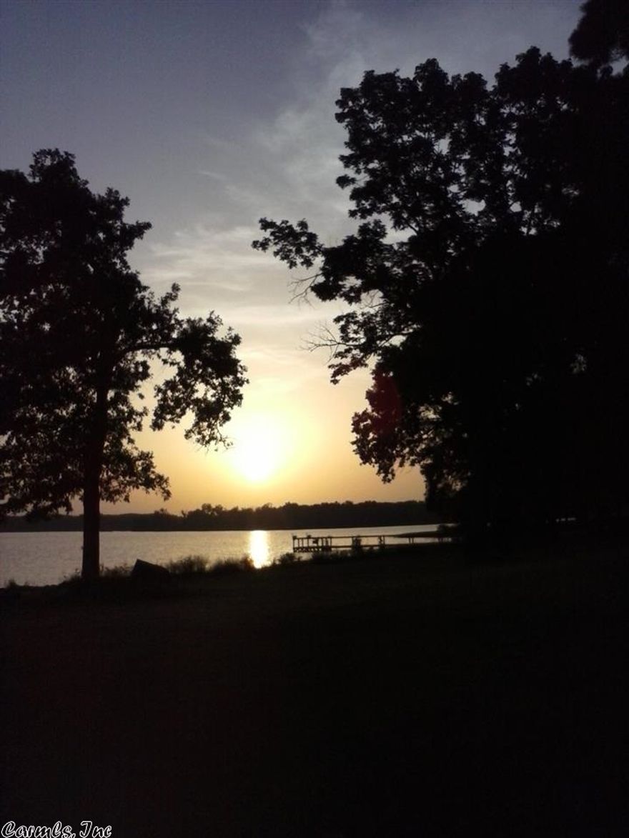 My brother has to move due to job transfer so he asked me to sell his lakefront home.  Our family has had many family gatherings at him home and have many fish stories to share - you know the ones that got away!  Call me and I will be glad to tell you some of them while showing you this magnificent lakefront property.  I think after seeing this property especially if you time it right and watch the sun setting behind Petite Jean Mountain.   You will definitely be hooked!