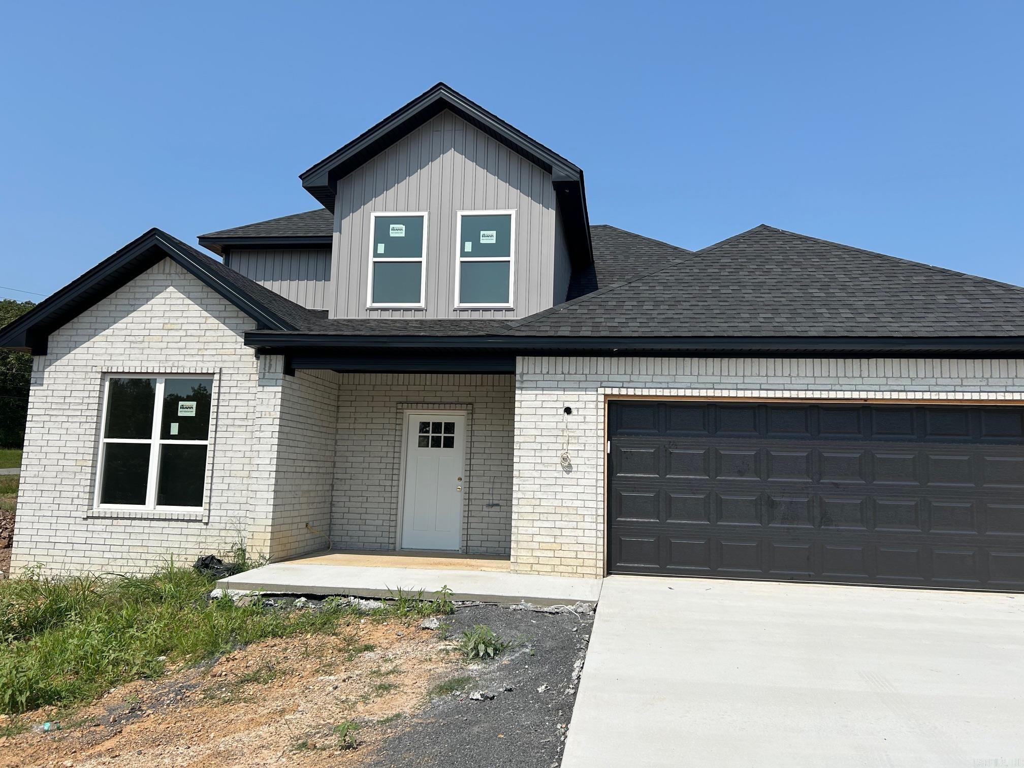Brand new construction located just minutes from Little Rock Air Force Base! This spacious home features 4 bedrooms plus a flexible 5th room that can function as a bedroom, office, or bonus space. The primary suite is conveniently situated on the main level, offering a large walk-in closet, a luxurious bath with custom tile shower, and quality finishes throughout. Enjoy an open-concept layout on the main floor, combining living, dining, and kitchen areas seamlessly. The kitchen is equipped with granite countertops, stainless steel appliances, and modern cabinetry. Flooring throughout is luxury vinyl plank for both style and durability. Upstairs includes three generously sized bedrooms and a spacious full bathroom, ideal for family or guests. Don’t miss this opportunity to own a beautifully built new home close to schools, shopping, and Little Rock AFB. Schedule your showing today!
