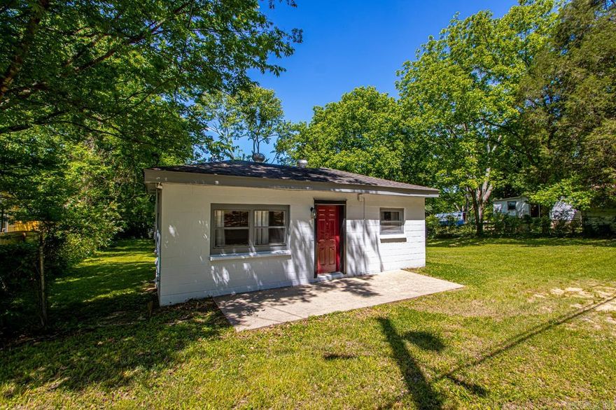 There are various opportunities with this property, including an extra lot for lots of space where kiddos can run and play or building a second income property! This home is completely move in ready with 1 bedroom with 2 large closets, living area, kitchen with extra counter space and storage and an extra room that could used as another bedroom or office. You'll find new flooring, new paint, new fixtures, new windows, appliances and a new mini split! **Please see agent remarks!