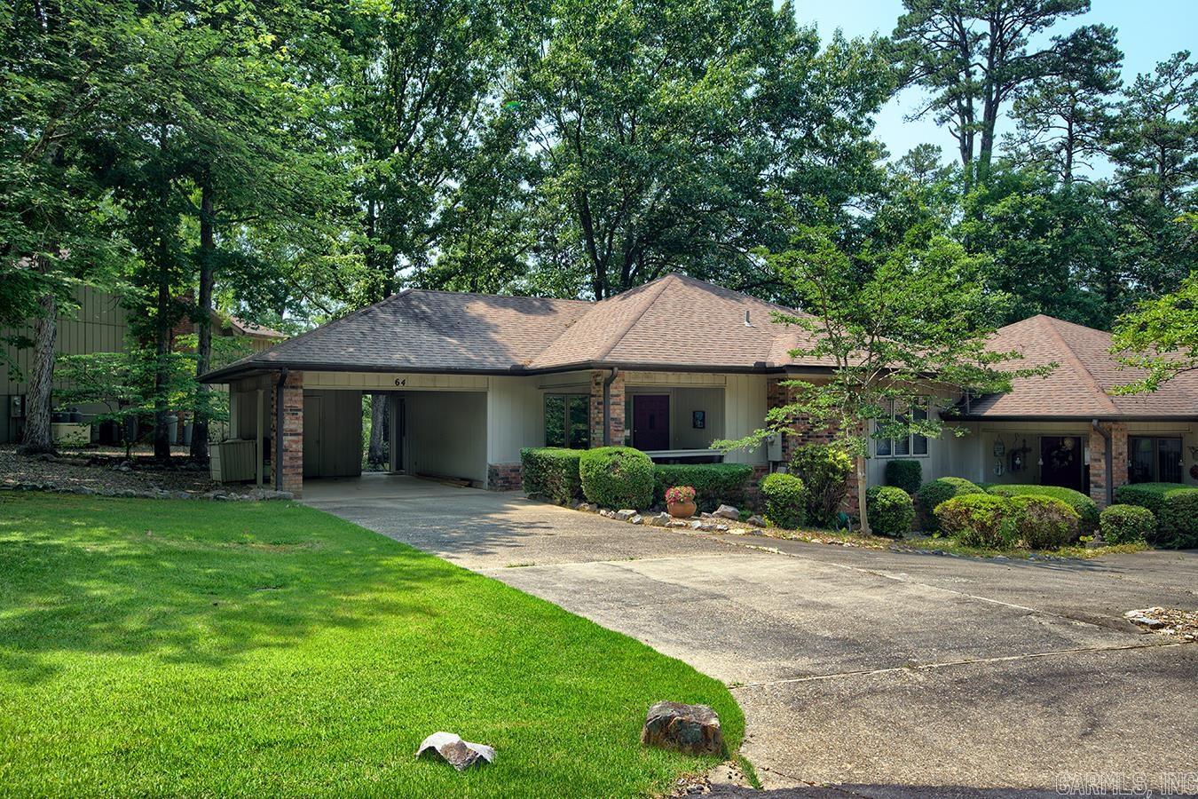Here, in the heart of the village, with pristine views of Lake Pineda, is a hard to find single level townhouse with your own private dock and large carport. Inside, the corner fireplace highlights the Living Room and Dining Area. Views of the natural yard, special seating areas and lake beyond are mesmerizing. Even the galley kitchen has its own sweet view. The 2 BRs and 2 baths have a fine feeling of space. There's a front porch with a charm of its own. The party-sized deck feels like an extension of the living area. Village golf courses including (Coronado's Par 3), the Coronado boat launch and trail, the major tennis complex, and the amazing Natatorium are close at hand. A stairway from the carport to the floored attic, crawlspace below living area and a storage room provide plenty of storage. This house truly shows like new home. The high efficiency HVAC, Water Heater, all plumbing and roof are newer. The dock was refurbished last year. Itās a short walk to the private covered dock with electricity, ceiling fan with light and flood lights, an open area, and a boat hookup on the other side. Majorca Courts has an automatic lake-fed watering system. New Buyers $1500 buy-in fee.