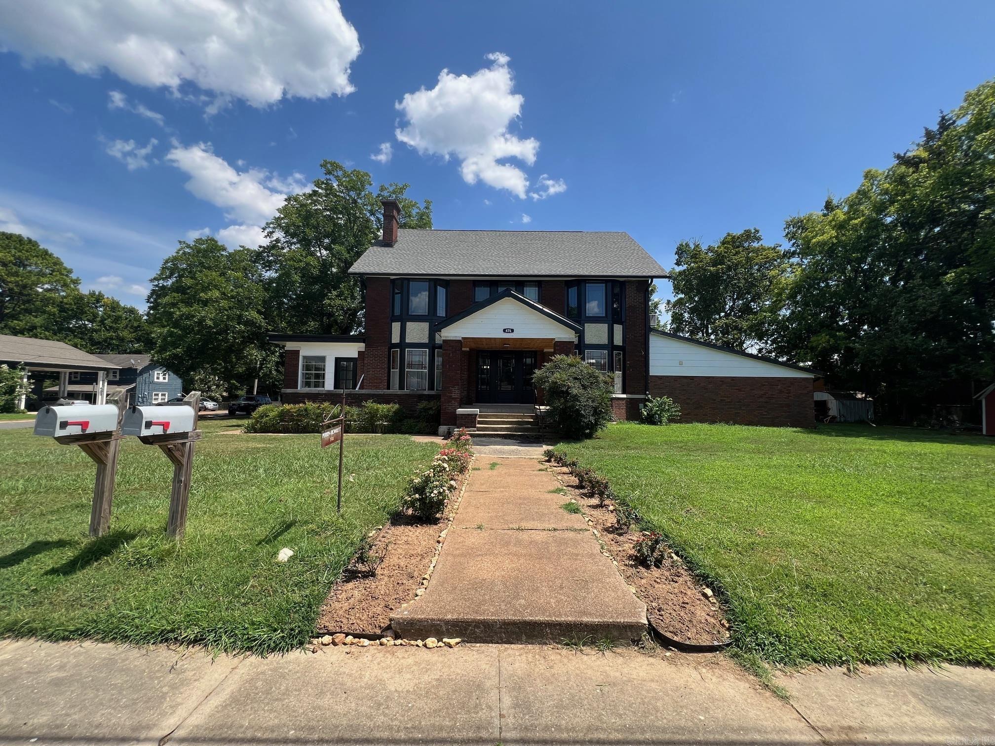 Large Historic Home Built in 1914. Current Homeowner has completed extensive repairs and improvements including replacing the Roof, New Windows, Updated Plumbing, Updated Electrical, Updated Heat and Air, New Fixtures, New doors, and more. Main house is a six bedroom and has two full baths and one half bath. Main house also has a attached one bed one bath apartment with separate entrance. There is a old rock carriage house that has been converted to a one bed one bath guest house.