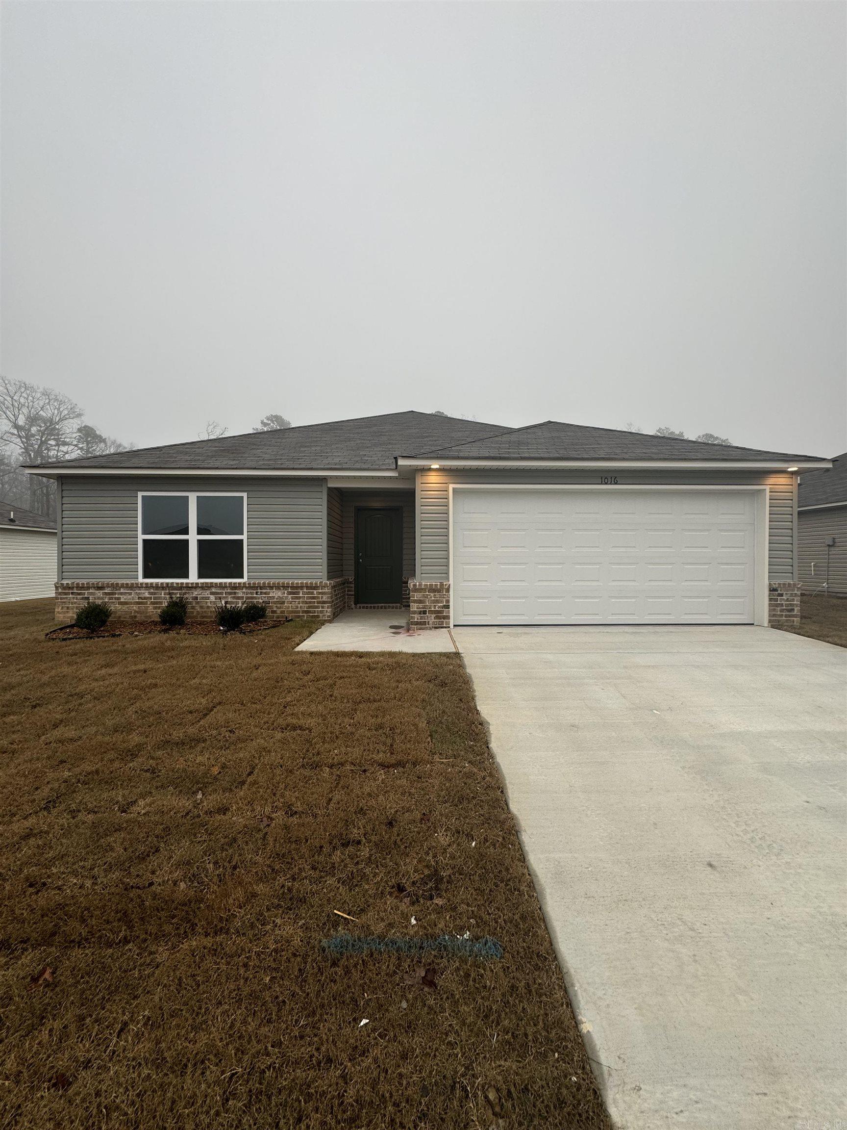 The Foster II plan is a time-tested favorite! It has a beautiful lead-in hallway that opens into a spacious Living Room and eat-in Kitchen. The Master Bedroom has a large walk-in closet that's separate from the bedroom. This plan also comes with a covered back patio! Tour it today!  Valuable upgrades included: 60" fiberglass standup shower (no enclosure) in Master Bath, plumbing faucet upgrade 2, 8" deep Kitchen sink, pull out Kitchen faucet, staggered Kitchen cabinets, 16" laminate bar top in Kitchen, Luxury Vinyl Plank flooring in wet areas and Living Room and adjacent hallways, raised ceilings in Living Areas per municipal requirements, fiberglass exterior doors, Cheyenne style doors, baseboards level 2, LED disk lights in Kitchen, level 1 ceiling fan in Living Room, full sod, stainless steel appliance package.       THIS HOME IS SCHEDULED TO BE COMPLETE IN MID DECEMBER.  ***AGENTS, PLEASE SEE AGENT REMARKS OR SHOWING REMARKS FOR VERY IMPORTANT INFORMATION.***  $100 initial assessment collected at time of closing.