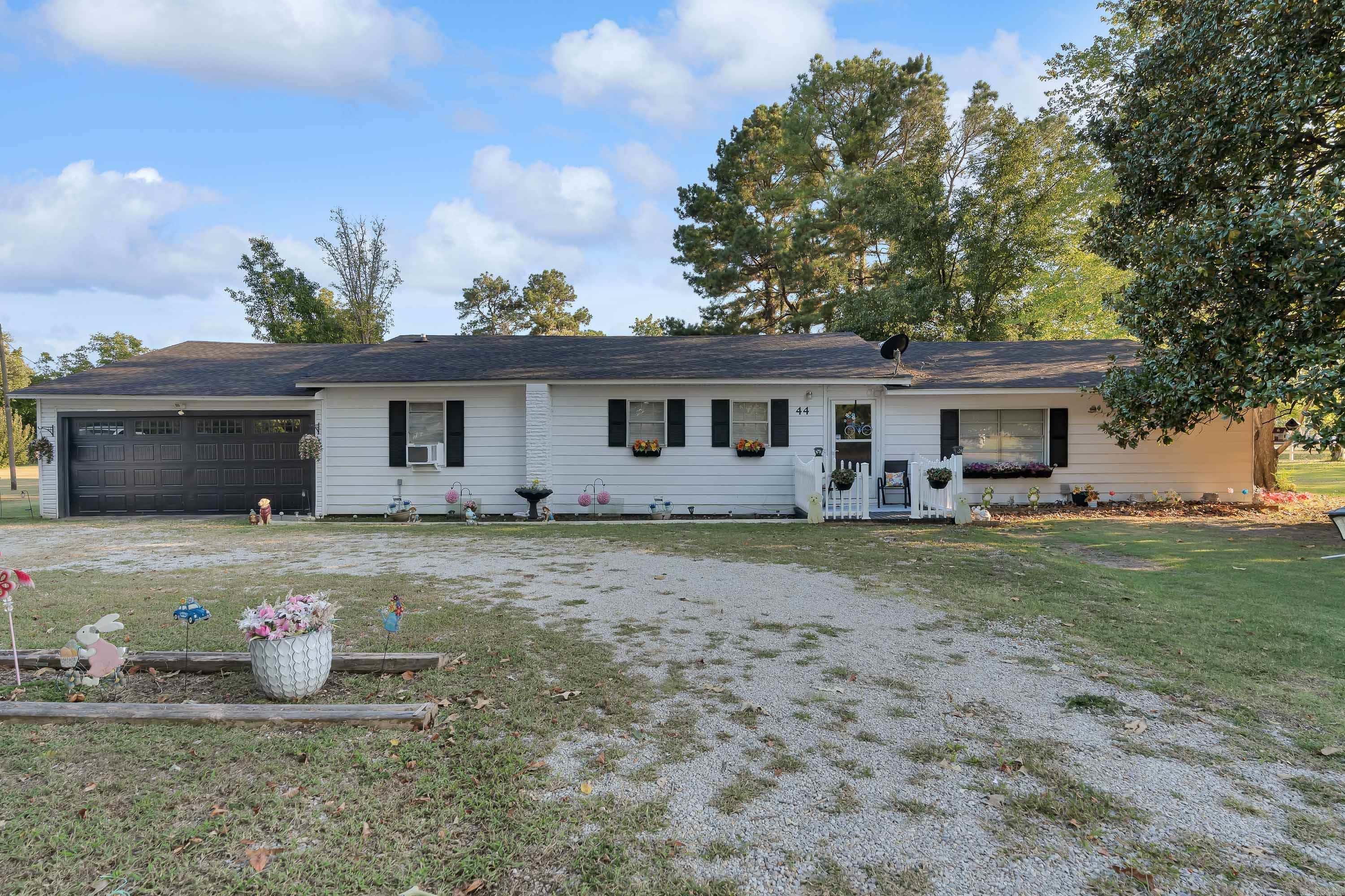 Welcome to 44 Oak Grove Rd, a beautifully updated 3-bedroom, 2-bath home sitting on 1.65 acres in Paragould. This property blends charm with peace of mind, offering a host of recent improvements that make it completely move-in ready. Step inside and youāll find fresh new flooring throughout, creating a warm and inviting atmosphere. The home features updated plumbing, electrical, and a new breaker box, giving buyers confidence in the homeās core systems. The brand-new roof adds long-term value, while the new garage door and opener enhance both curb appeal and convenience. With spacious living areas, generous bedrooms, and a large lot perfect for outdoor activities, this home has room for both relaxation and entertaining. The 1.65-acre lot provides privacy, space for hobbies, or even future expansion. Call or text to schedule your private showing today!