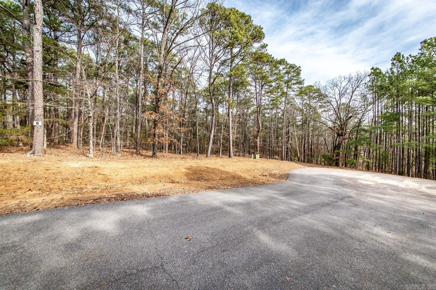 Just what the doctor ordered. Four lakeview/front tracts containing 3 m/l acres. Minimum restrictions and all utilities underground (will need to be perked), including fiber internet. Paved streets, secluded and private feel with all the pleasure's of LAKE LIFE. Don't miss out.
