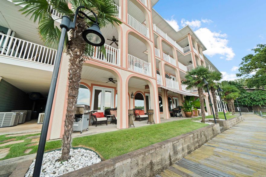 Lake Hamilton Luxury Condo – 3,808 Sq Ft + Rare Boat Slip & Lift for the Fiesta Bay gated community. This lavish unit has 3 bedrooms, 3 full baths, and 2 lovely powder rooms. Entertainer’s dream with 2 gourmet kitchens, dual laundry rooms, and a luxury primary suite with a dream closet. Massive open layout, perfect for hosting family & friends. Rare private boat slip with lift makes lake life effortless. Live large, entertain bigger, and enjoy the best of Lake Hamilton! Selling beautifully furnished. This prime Central Ave. location sets you right on the main channel and is close to all that Hot Springs has to offer.