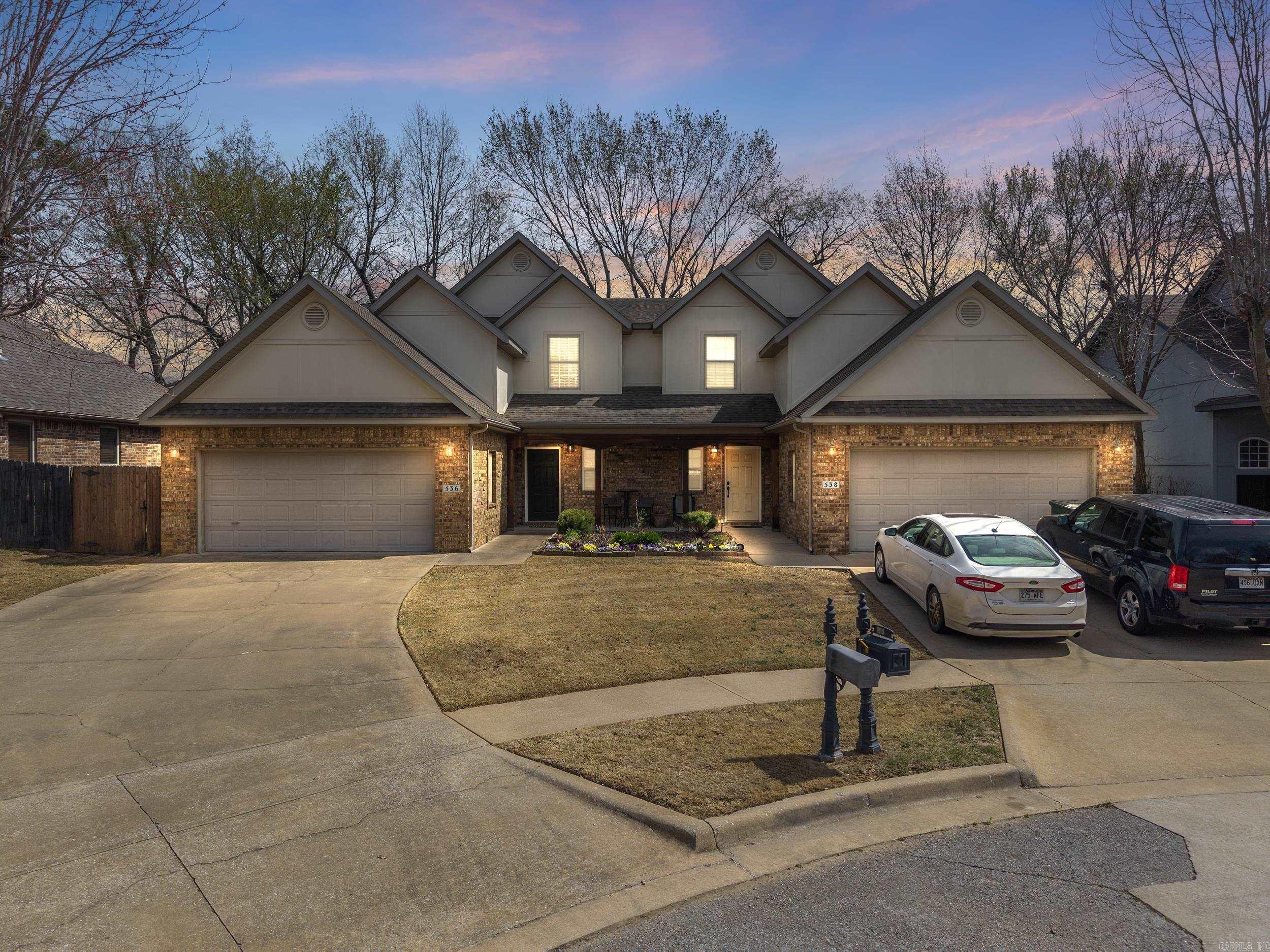 This charming two-story townhouse is situated just off South Crossover in Fayetteville, offering easy access to the University of Arkansas and downtown. It boasts 4 bedrooms, 2.5 bathrooms, a 2-car garage, a gas log fireplace, hardwood floors, and granite countertops. The fenced backyard features a patio, and the master suite includes a whirlpool tub and sellers are negotiable to selling furnishings!