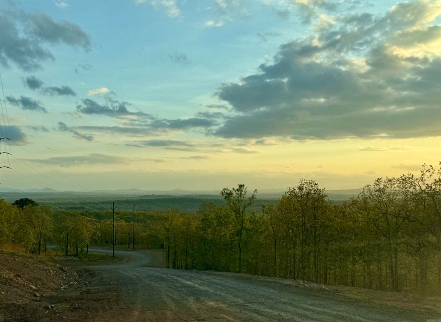 Introducing Seven Lakes Ranch Estates ~ a premier gated acreage community redefining luxury country living in the Conway area. Set against breathtaking views of Lake Conway and Pinnacle Mountain, this exclusive development features seven stocked lakes, scenic nature trails, rolling topography, and abundant wildlife. Each 3–5 acre homesite offers the privacy and space you’ve been searching for, complete with paved roads, a gated entrance, and available utilities. Perfectly positioned just 10 minutes from I-40 in Mayflower, 15 minutes from downtown Conway, and approximately 25 minutes from West Little Rock and Cabot, Seven Lakes Ranch Estates delivers both tranquility and convenience. With community-wide road paving planned for summer 2026, and a 2,400 sq. ft. minimum for this lot, you’re invited to bring your builder—or work with one of ours—to craft a custom home that fits your vision.  **Owner financing is available.**