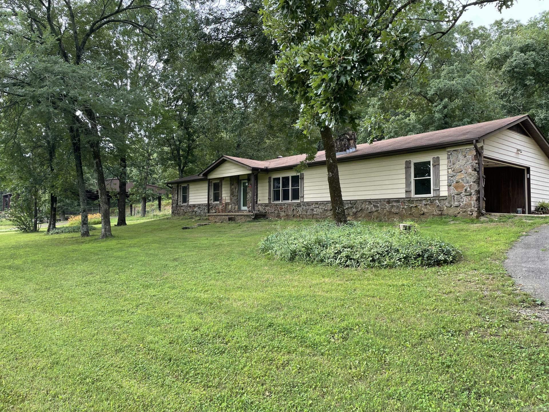 This charming, secluded single family home located at 27721 AR-107 in Cabot, AR was built in 1977 and offers 3 bedrooms, 2 bathrooms with a total finished area of 1,883 sq.ft. The property sits on 32 acres. The home features a traditional layout with ample living space and who enjoy the outdoors. With its convenient location and cozy atmosphere, this property is sure to appeal to a wide range of buyers looking for a comfortable and inviting place to call home.