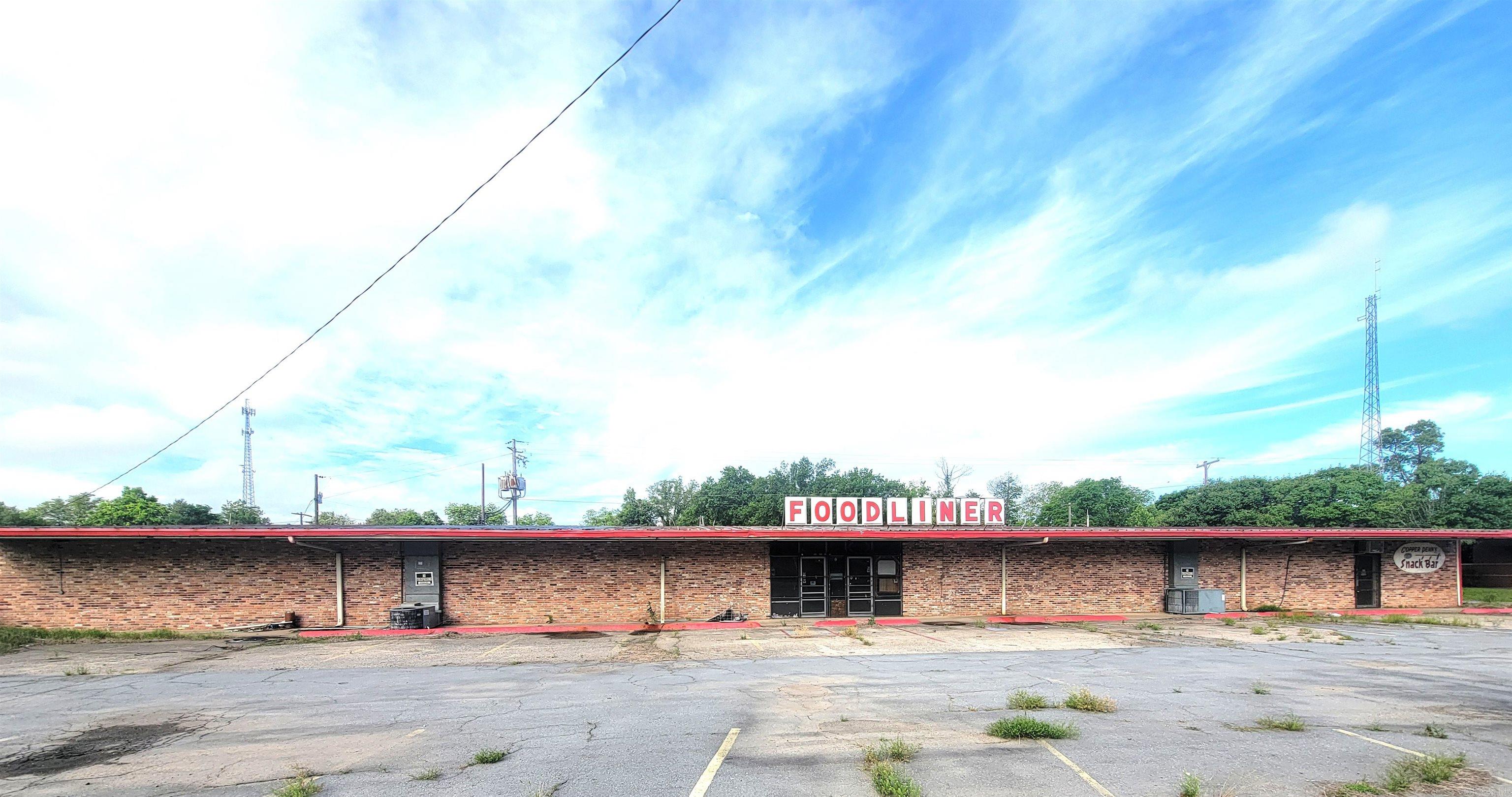 This 11,900 square foot former grocery store with an in-house cafĆ© offers a unique opportunity for a variety of business ventures. The space includes a commercial kitchen setup, walk-in freezers, and a dedicated cafĆ© area, making it ideal for a restaurant, market, food hall, or commissary kitchen. With tons of storage space, a flexible open floor plan, and existing infrastructure, this property can easily be adapted for uses such as a retail center, fitness or wellness facility, office space, or a community gathering hub. The building features excellent visibility, ample on-site parking, and convenient loading and delivery access. Itās located in a growing area with high traffic and strong residential support, making it a prime spot for a new or expanding business. This is a rare chance to own a large, well-equipped commercial space with built-in features that can save on startup costs. Donāt miss the opportunity to bring your vision to life in this versatile and spacious property.