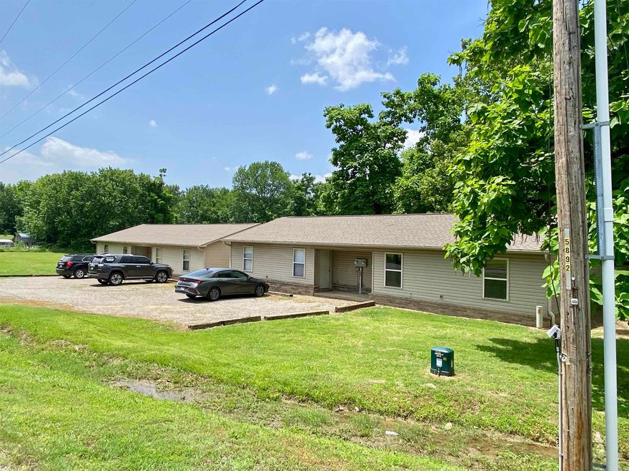 Rental package built in 2017!  Low maintenance!  Efficient!  All electric, vinyl flooring, solid kitchen cabinets, architectural roofs, w/ all appliances conveying.  The property consists of 2 duplexes each 2br, 1BA, an older single wide mobile home, & enough land to build additional units.  2 duplexes rent for $695 w/ water pd.  2 rent for $825 w/ elect/water pd.  The mobile rents for $400 w/ no utilities included.  Each duplex is 1622 sq.ft. & the mobile is 360 sq.ft.  Trash & lawn provided by the owner.  Little to no maintenance required due to age & low maintenance features.  Call today to inquire.