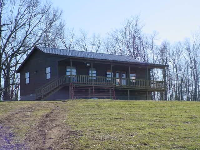Contiguous 435 acres of property with timber and pasture with frontage on state highway on one side and county road on another. Property features trails, ponds, creek access, and stunning views. Ideal for hunting white tail deer. Cabin can be used as a permanent home, weekend place, or hunting cabin. Seller will consider splitting property under right circumstances. South side of the property with access from King Road is suitable for development offering pastoral views. 03086-25009