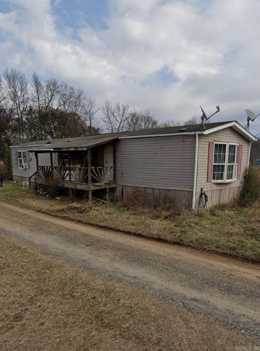 Peaceful Country Living with a small Mobile Home, Barn sitting on 5.65 +/- acres  SOLD AS IS