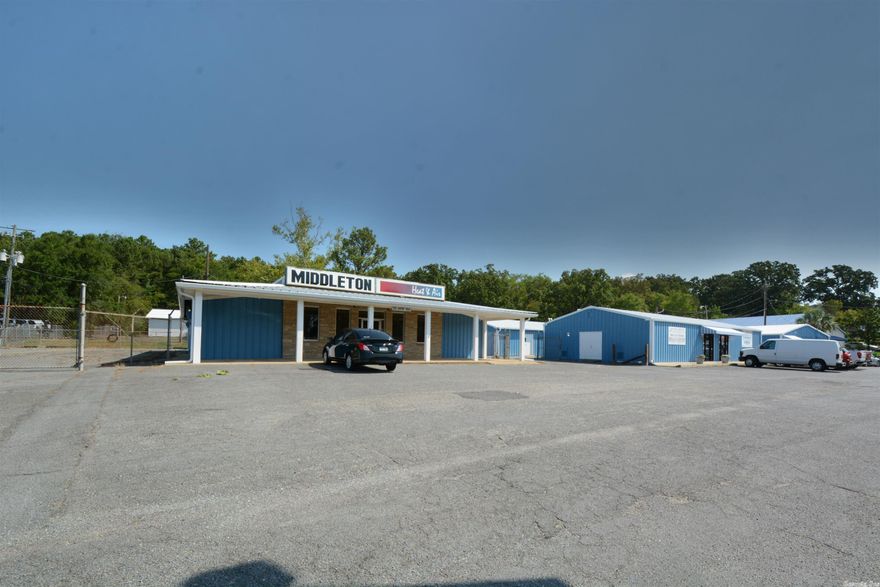 GREAT INVESTMENT PROPERTY WITH RENTAL INCOME-5 BUILDINGS WITH A TOTAL OF 11940 SQUARE FEET UNDER ROOF, (ZONED M-1, M-2 LIGHT MANUFACTURING, WHOLESALE, WAREHOUSING) ON  2.4 ACRES WITH EXTRA LOT AND BUILDING SPOTS, ADDTIONAL 3 STORAGE BUILDINGS FENCED IN.  269 FT ROAD FRONTAGE-- SHOP IN REAR (2008 SQ FT) SET UP FOR ELECTRICAL/ SHEET METAL SHOP--5 OPERATIONAL BUSINESSES (HEAT & AIR, WEED CONTROL, INSURANCE, OFFICE SUPPLY, FLORIST) 2- VACANT 918-E - & WHITE SHOP)
