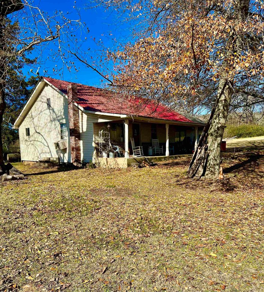 This 4 bed 2 Bath home  located right on HWY 70W features approx 1482 sq ft.. Plus a huge shop that could have multi purposes with easy access. Concrete pad for an RV hook up and storage shed, all on 1.7+/- Acres. Large shade trees.  Front porch for sitting looking out at the beautiful mountain views.