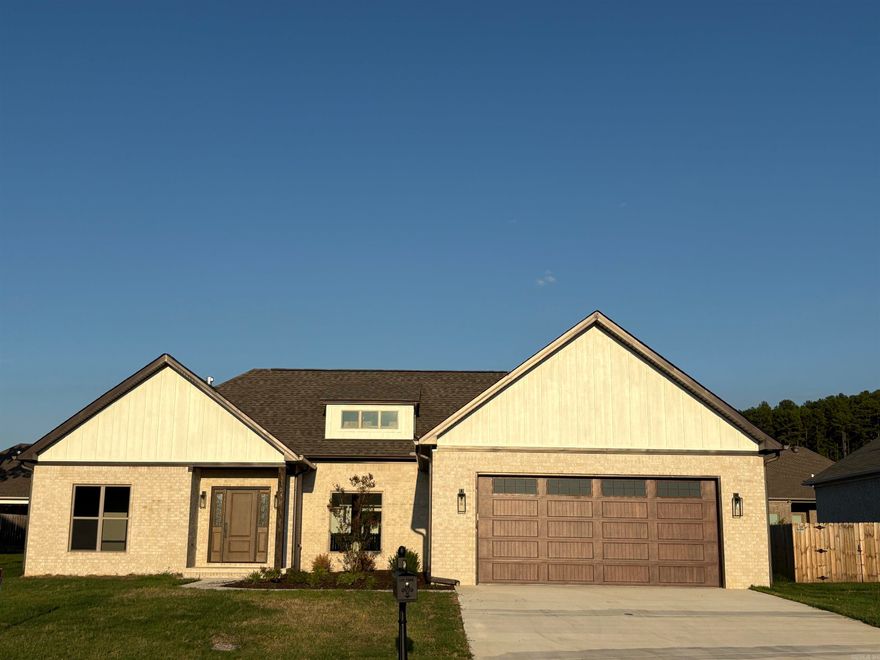Very energy efficient. OFFICE WITH CLOSET. COULD BE 4TH BEDROOM. Custom finishes throughout. 9 & 10 ' ceilings with crown in Main area. Custom cabinets. Granite throughout large island with farm sink, roll out drawers and soft close doors, walk-in pantry with built in cabinets and shelves. Master has lighted vanity mirrors, a soaker tub, walk-in shower and huge walk-in closet with built in dressers and shelves. Mud and coat area. Luxury vinyl floors and tile in wet areas. Tankless water heater, recirculating system for instant hot water. Gas grill and t.v. connections on covered back porch with approx. 12 x 12 extended patio.