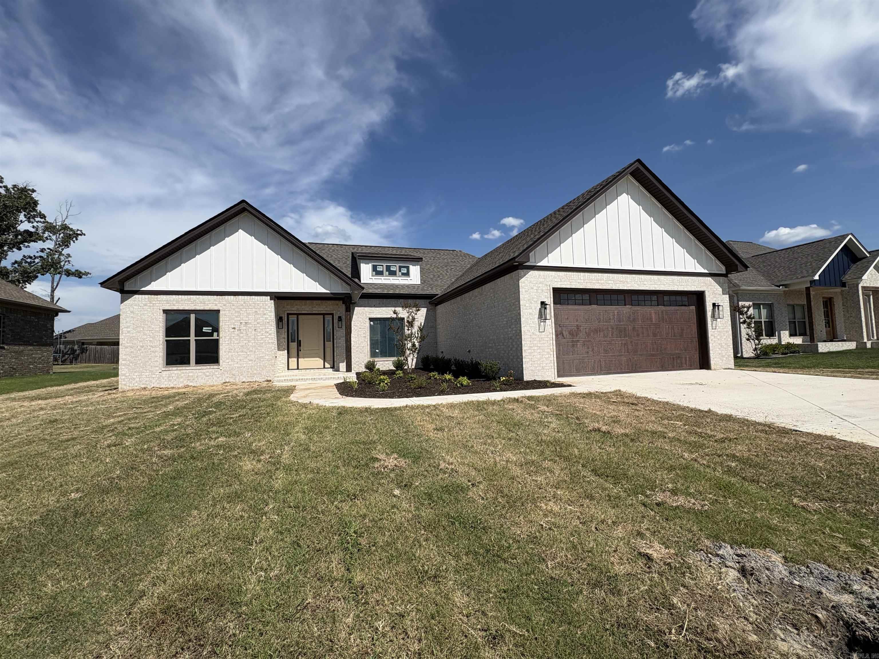 Very energy efficient. OFFICE WITH CLOSET. COULD BE 4TH BEDROOM. Custom finishes throughout. 9 & 10 ' ceilings with crown in Main area. Custom cabinets. Granite throughout large island with farm sink, roll out drawers and soft close doors, walk-in pantry with built in cabinets and shelves. Master has lighted vanity mirrors, a soaker tub, walk-in shower and huge walk-in closet with built in dressers and shelves. Mud and coat area. Luxury vinyl floors and tile in wet areas. Tankless water heater, recirculating system for instant hot water. Gas grill and t.v. connections on covered back porch with approx. 12 x 12 extended patio.