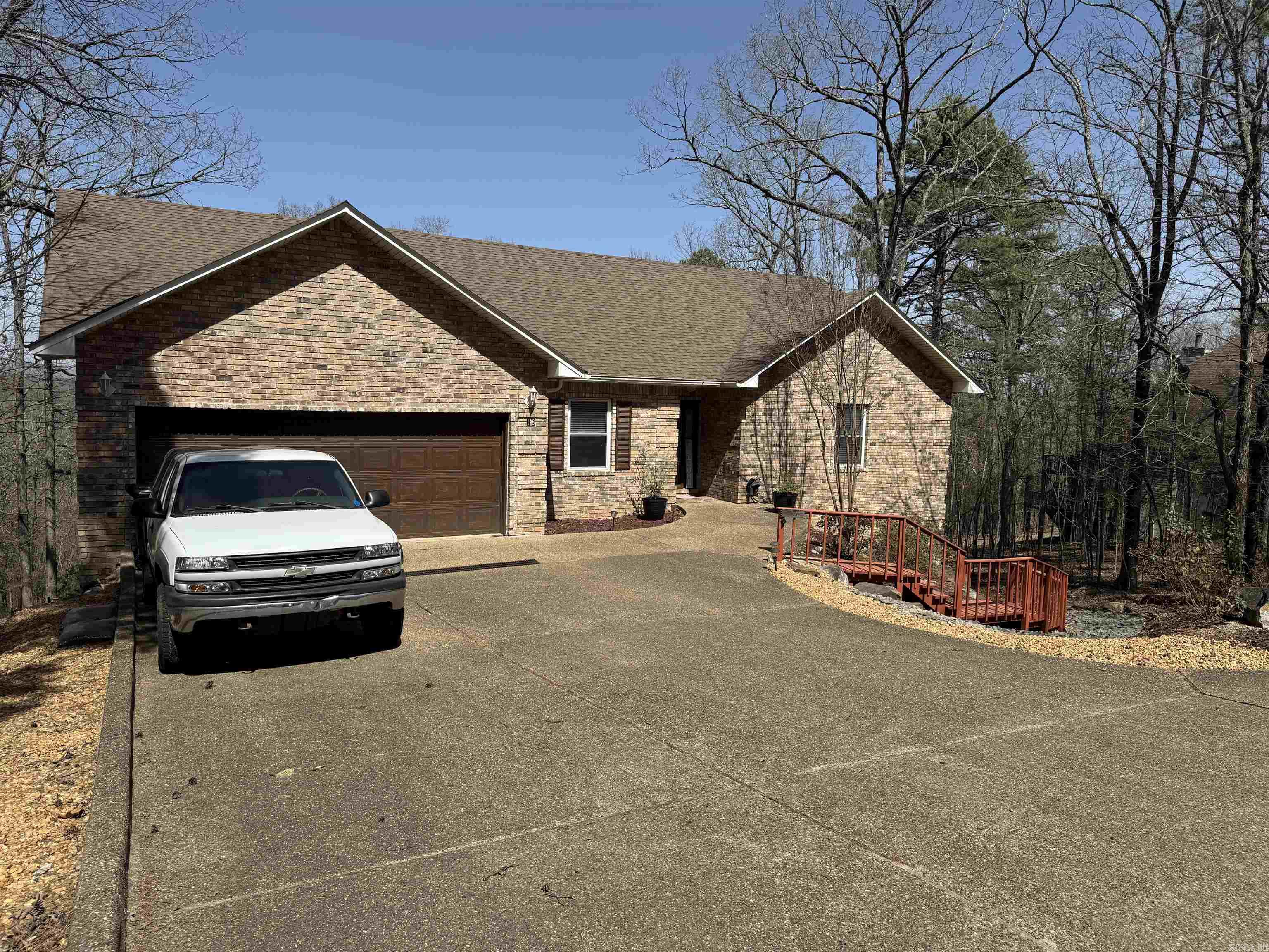 Absolutely beautiful all-electric home w/two living spaces w/a separate entrance nestled in the countryside of HSV overlooking Lake DeSoto and mountain views. The rear of the homes has two lighted decks that stretch the full length of the home for spectacular views all year round. Kitchen has beautifully naked cabinets. Granite counter-tops and backsplash. Name brand appliances throughout. Exit MBR to deck thru sliding doors to jacuzzi hot tub. The lower level can be used as in-laws quarters, living space for additional family members or rental. Extra room can be used for working at home w/your own office space. Large WIC. Underneath home is unfinished basement. Two HVAC units. Beautifully hardwood and VFP flooring throughout, tile in bathrooms w/soaking tub. Safe room. Fenced backyard. Granite face FP w/wood frame. Cabinets galore w/sink in laundry room. Come one come all to see your new or vacation home, or a great Airbnb. Move in ready. Call today for your personal showing.