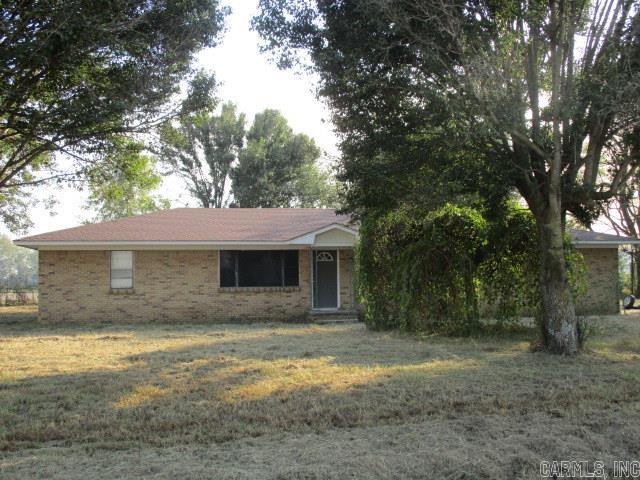Investment Opportunity for this 3 BR / 2 BA all Brick Home sitting on 1.0 acres on a paved road. Metal Outbuilding in Chain Linked Fenced Yard. Roof has been replaced in the past several years and the AC unit was new in 2011. Property to be sold "AS IS". No Property disclosure is available. Trash out will be completed by 11/2/24.