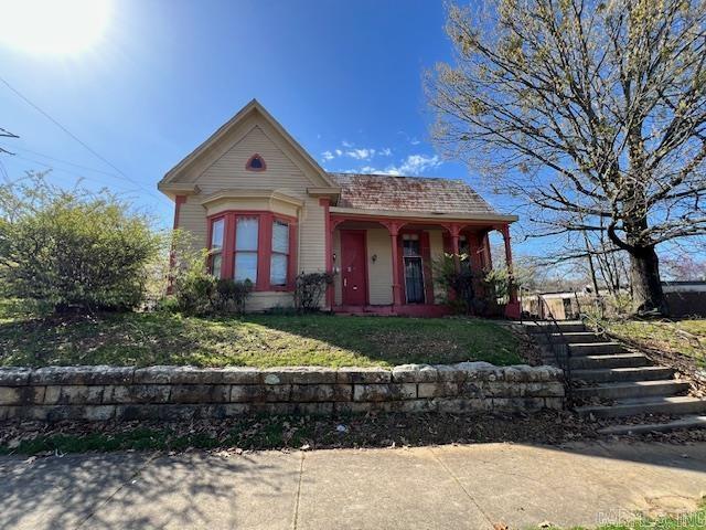 This home is located in a great area close to a church, schools, shopping, transportation and other amenities. It is spacious one level home with 3 bedrooms, 2 full baths, 3 living areas and an office. It needs work but could be a showplace once it's all completed. Sales price is based on APPRAISED value; however, the owners are aware that some work is needed and are ready to negotiate. Bring your contractor and put your numbers together. Let's see if we can make a deal work. There is a second home a block down the street at 2223 S. Main that could make a good bundle deal. Sold As Is. No repairs. No termite policy provided. Seller will not turn on utilities for inspection and should be noted in offers. Please allow 48 hours for response on offers. Verify zoning and sf. Great 203K for the right buyer or perfect for investors. Check with Arkansas Historic Preservation for any tax credit information and rehab requirements.