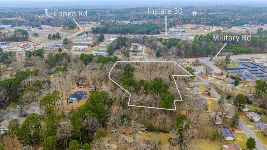 Prime Corner on Military Road. Access from two roads Military and Northshore. Zoned C-2. Great for retail, restaurant, or offices.