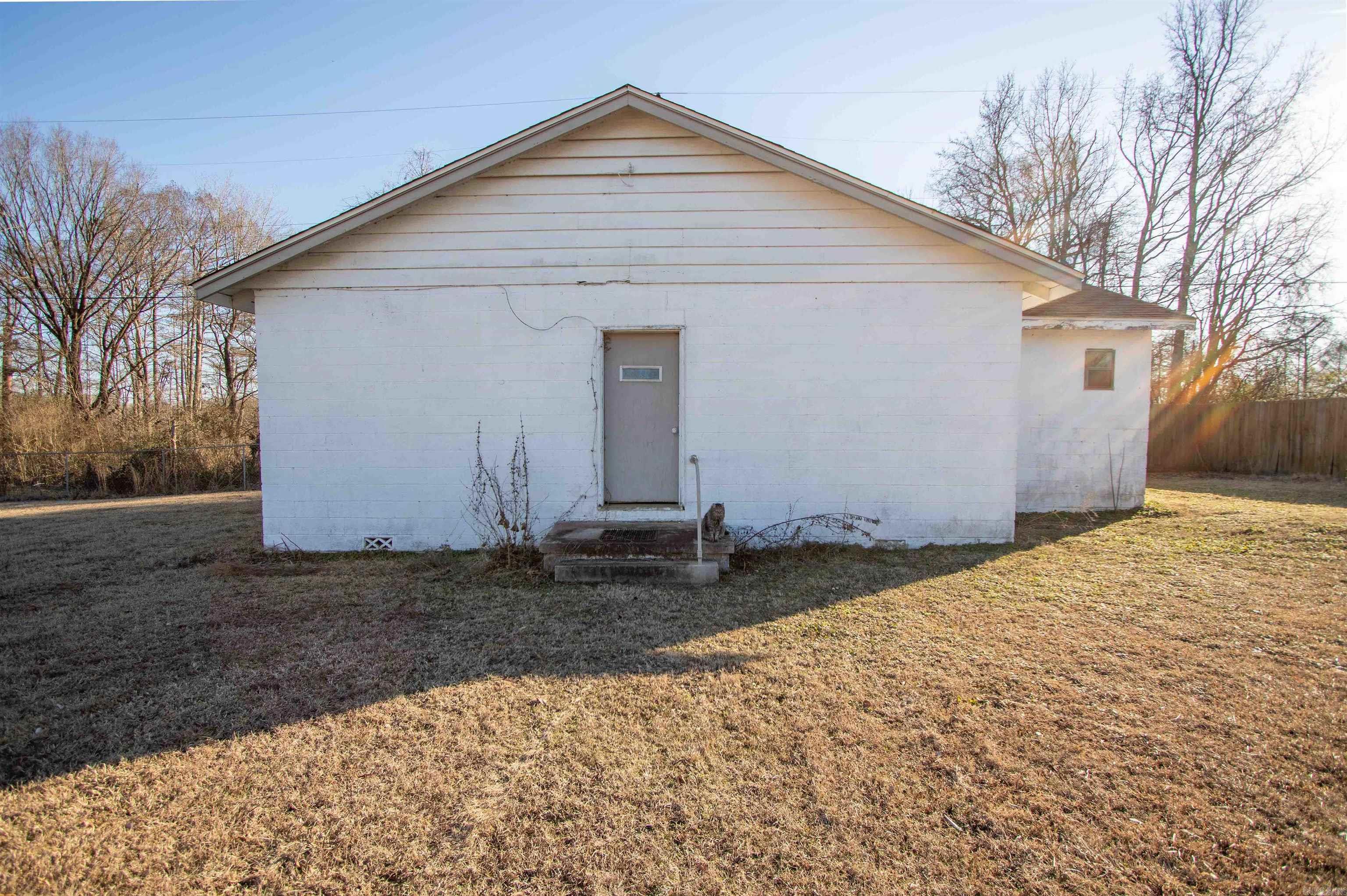 Fantastic investment opportunity! This unique property features a 1,072 sq. ft. concrete block church and a 1,040 sq. ft. building, both packed with potential for creative uses. Situated on 0.51 acres made up of three lots, the property offers ample space to develop or repurpose to suit your needs. Located just outside the city limits of Sherwood, this property is surrounded by multi-family duplexes, making it an excellent option for investors looking to tap into the area's rental or redevelopment potential. With its prime location and versatile buildings, this property is ready for your vision. Donāt miss outāopportunities like this are rare!