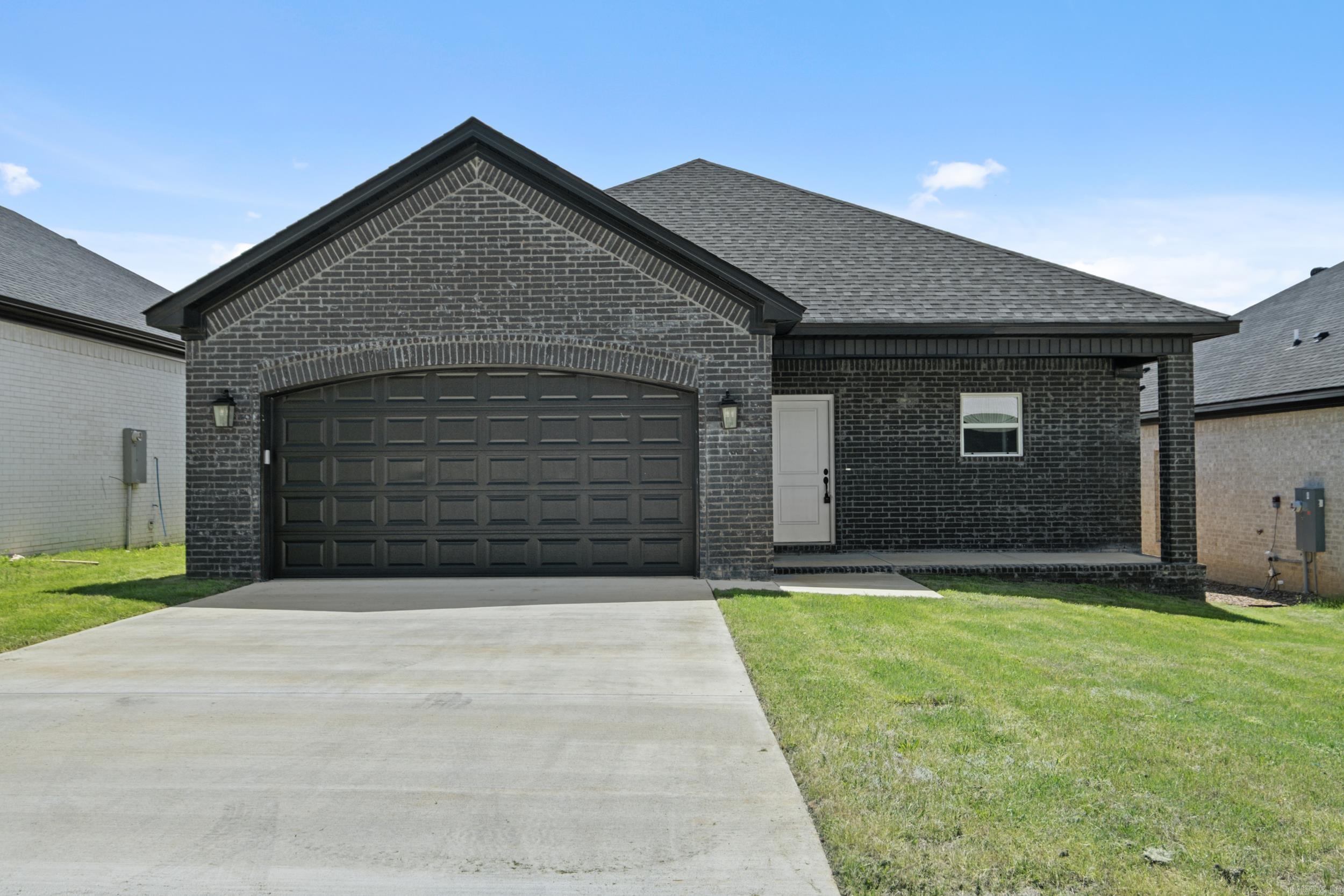 Affordable New Construction in Sherwood. This home is beautifully built with attention to detail. Covered porch in the front and covered patio in the back. All brick for easy maintenance. 9'-10' Ceilings throughout. Granite counter tops. Stainless Steel appliances. Crown molding throughout the home. Windows capped and trimmed. Walk-in master closet. Hardwood floors in living room, kitchen, and dining area. All electric for easy maintenance.