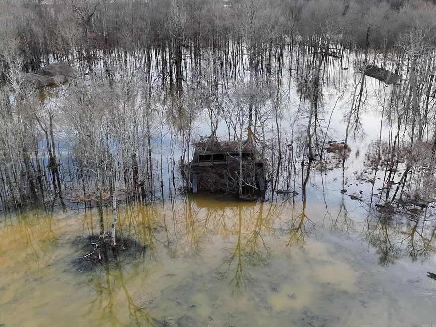 Just west of Jonesboro, tucked deep in the legendary Cache River bottoms, lies a 40-acre tract that feels less like a property and more like a story waiting to be lived. This is the kind of place duck hunters talk about in quiet tones, where cold mornings meet flooded timber, where wings whisper through the canopy, and where mallards finish in the trees. It’s a rare combination of accessibility and authenticity.  Extensive work has gone in to improve this tract to make it truly turn-key for its next owner. Levee work across the property for water management allows the owner to control water, both on and off, at all times of the year. At the heart of the property sits a well-built 8’ x 24’ duck blind, perfectly positioned for timber hunting and comfortable enough for long mornings in the woods. The property also features a brand-new 16” well, providing reliable water management to flood and hold timber when it matters most.   Properties like this don’t come along often. A true Green Tree Reservoir, in the Cache River bottoms, with proven duck numbers, existing infrastructure, water control, and location, this is not just a recreational tract; it’s a legacy property.